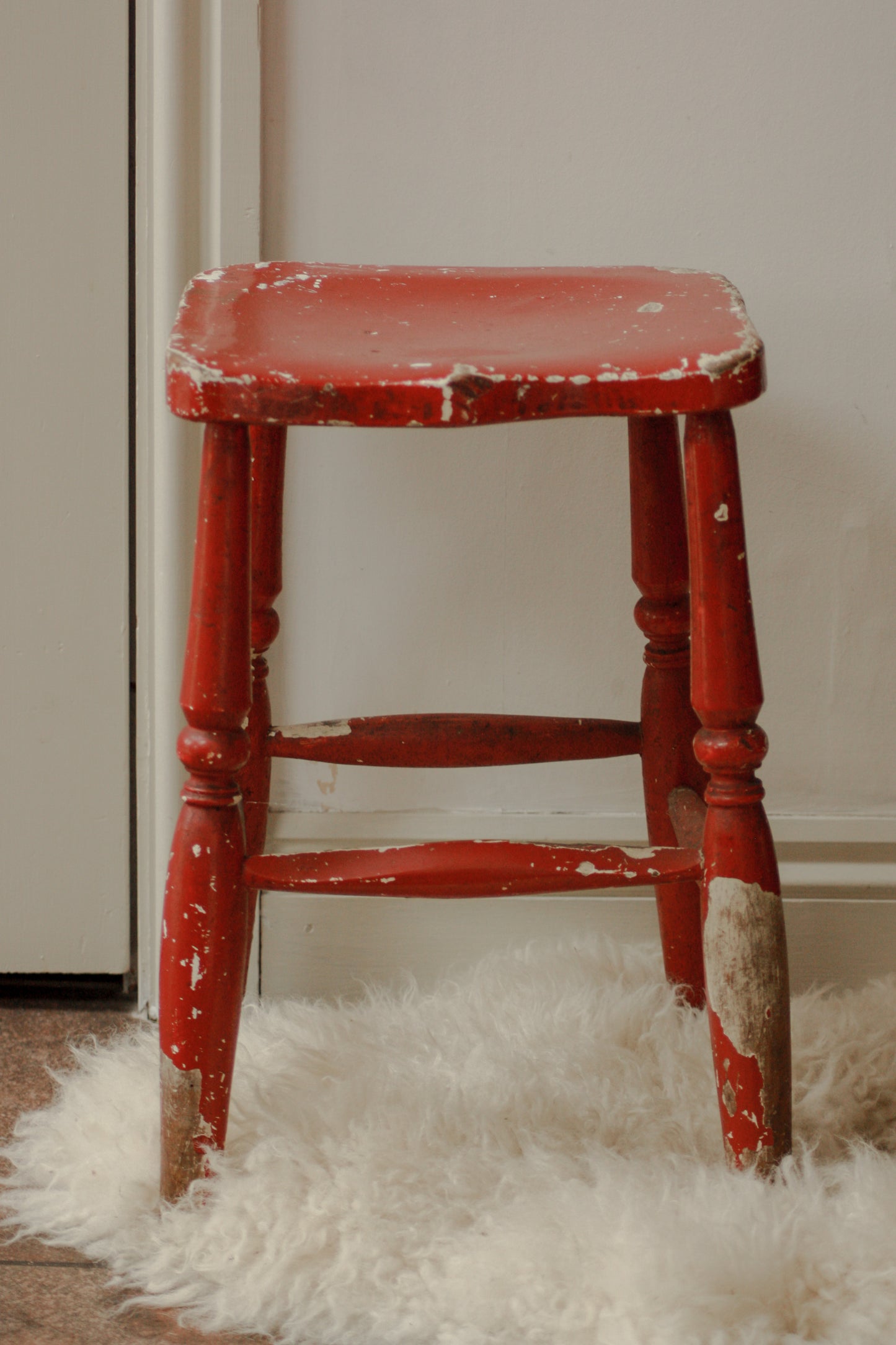 Vintage chippy red stool