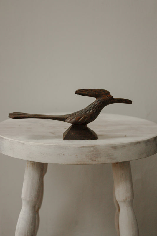 Vintage hand-carved wooden woodpecker