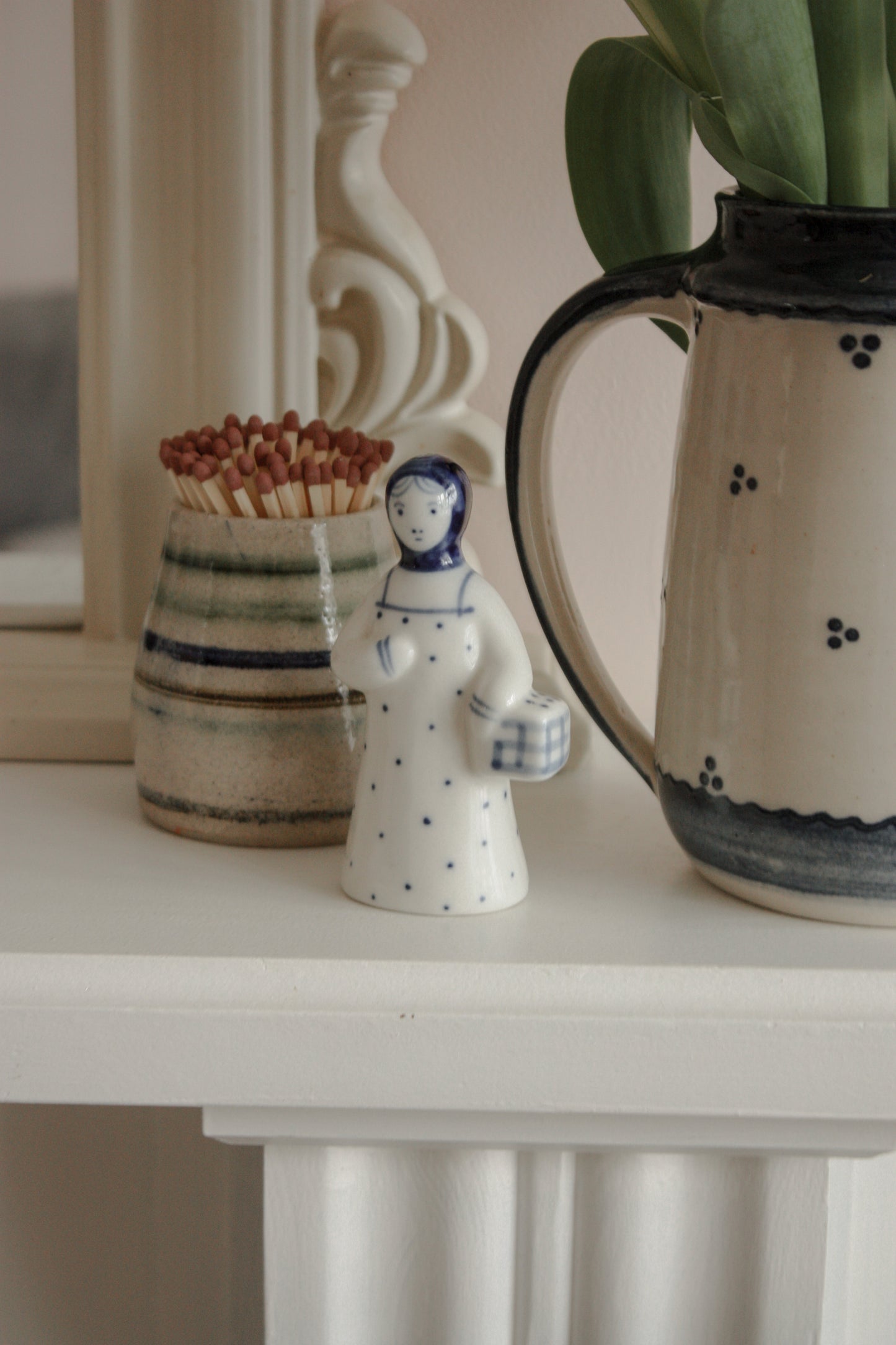 Vintage handpainted blue and white girl figurine