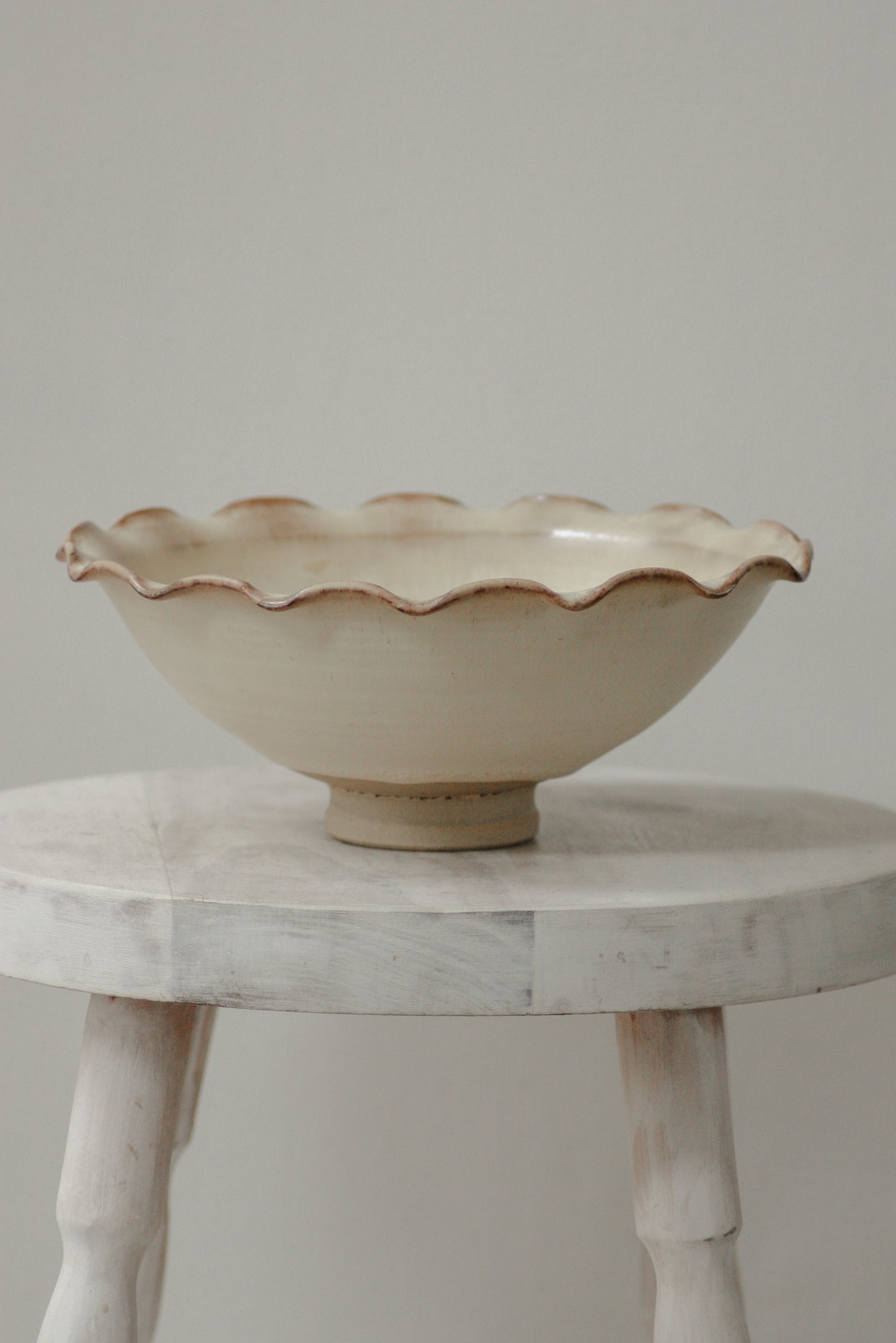 Studio pottery ruffle rim bowl