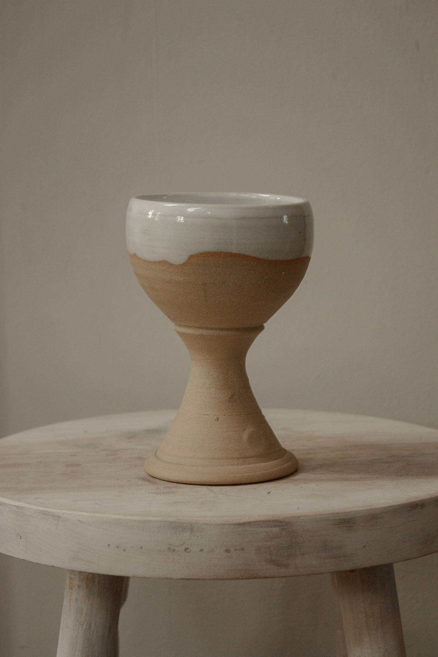 Studio pottery goblet with rustic white glaze