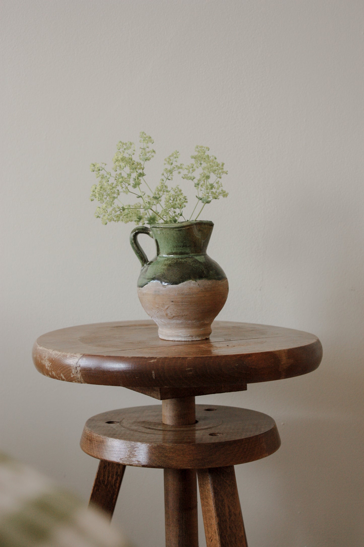 Vintage wooden stool with adjustable seat