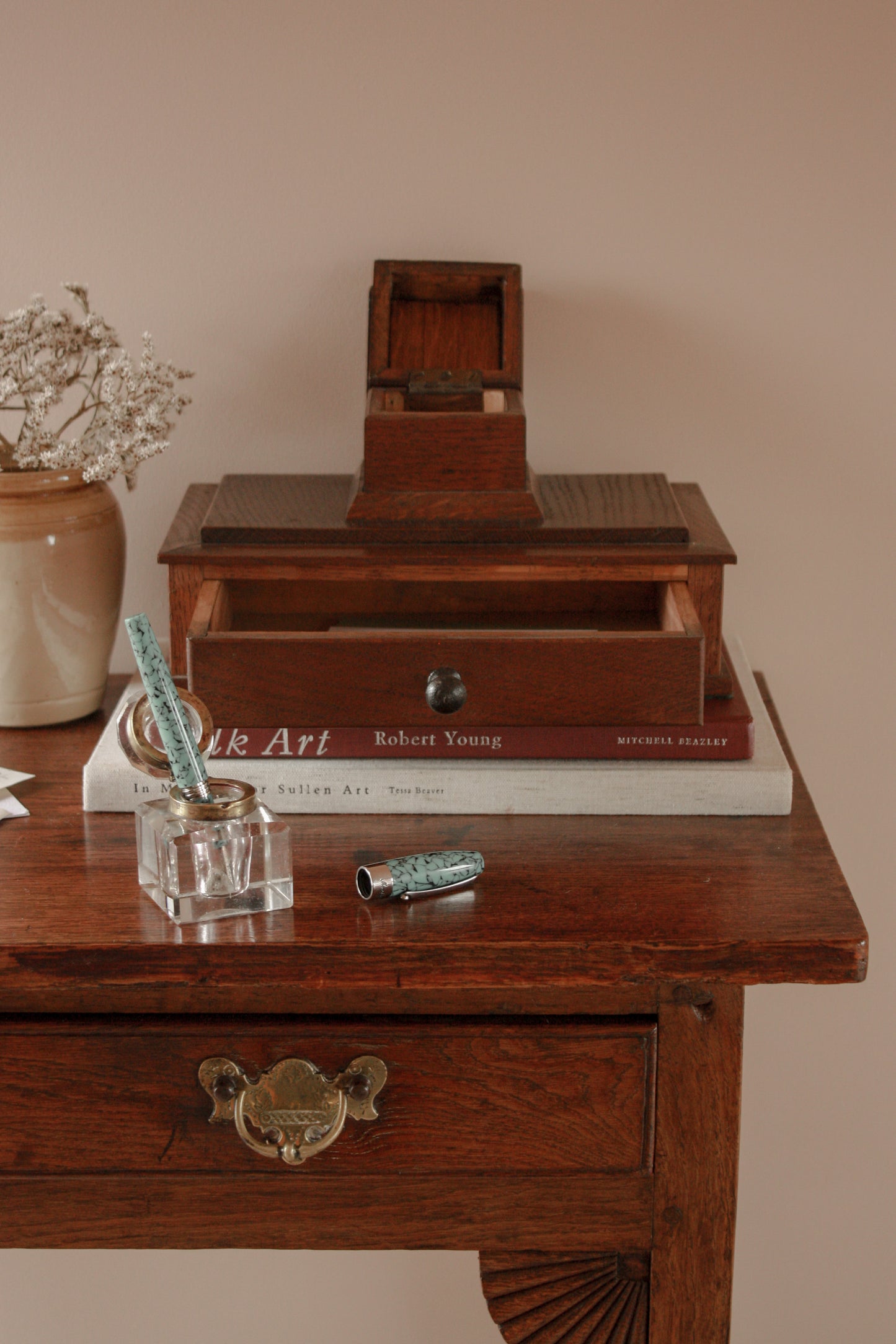 Vintage wooden desktop drawer with ink well