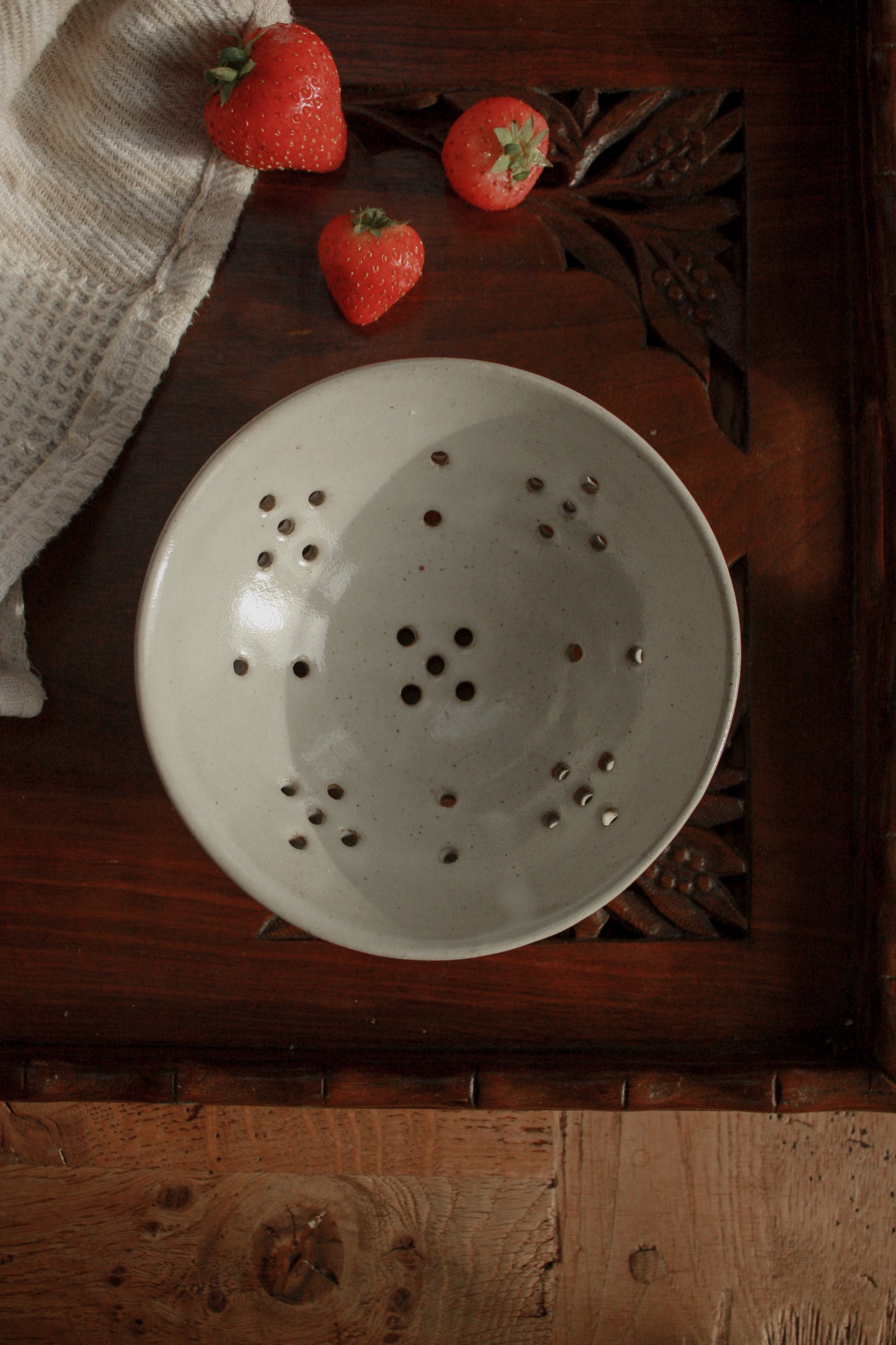 Studio pottery strainer bowl