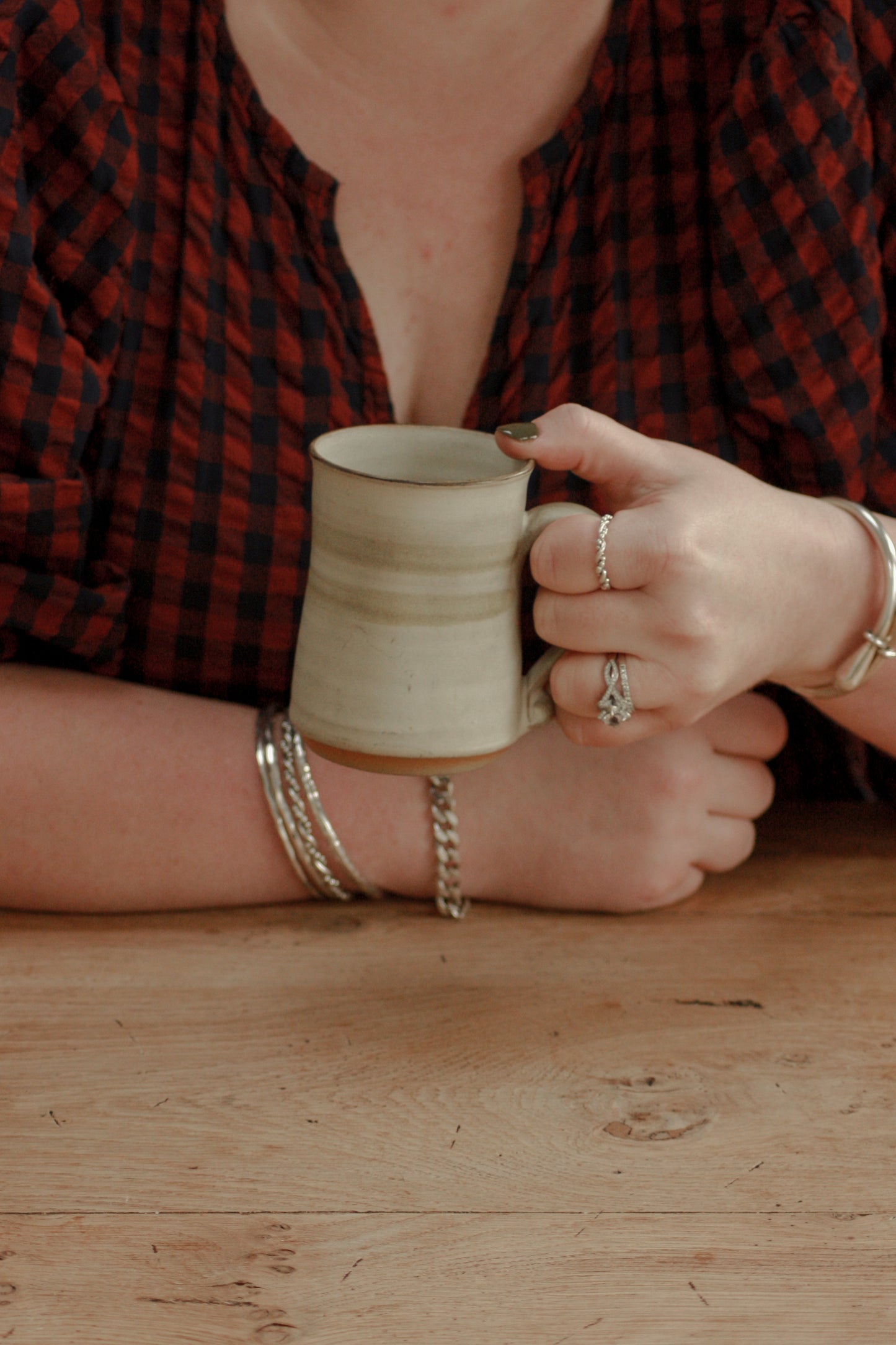 Vintage studio pottery mug with muted green stripe