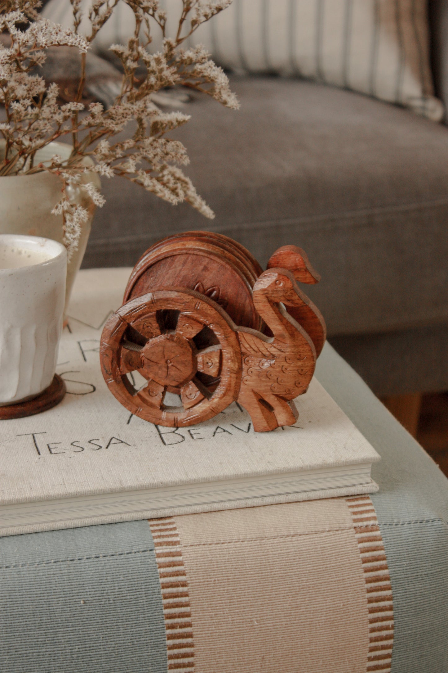 Vintage coaster set with hand carved peacock stand