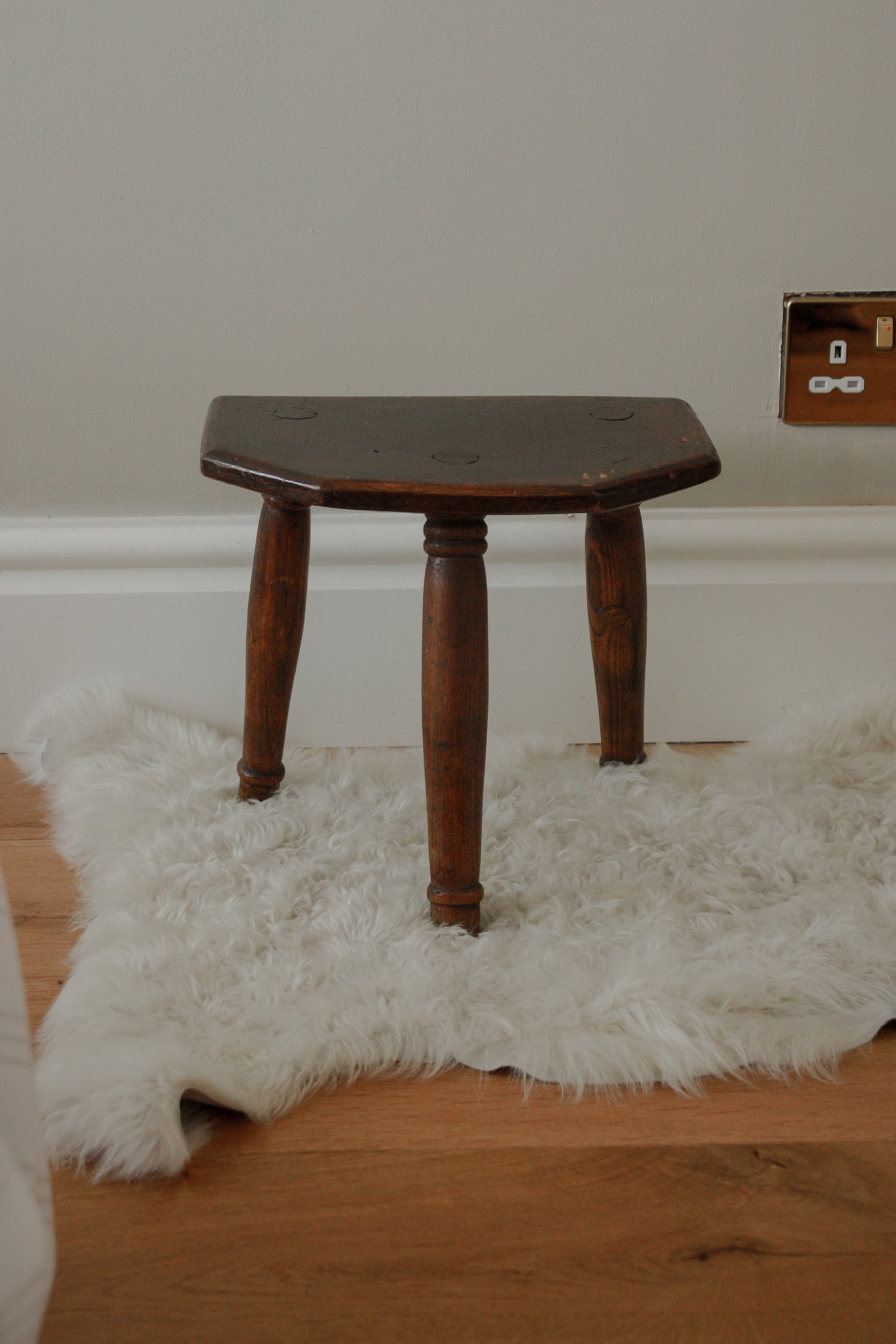 Vintage wooden stool with half hexagon seat