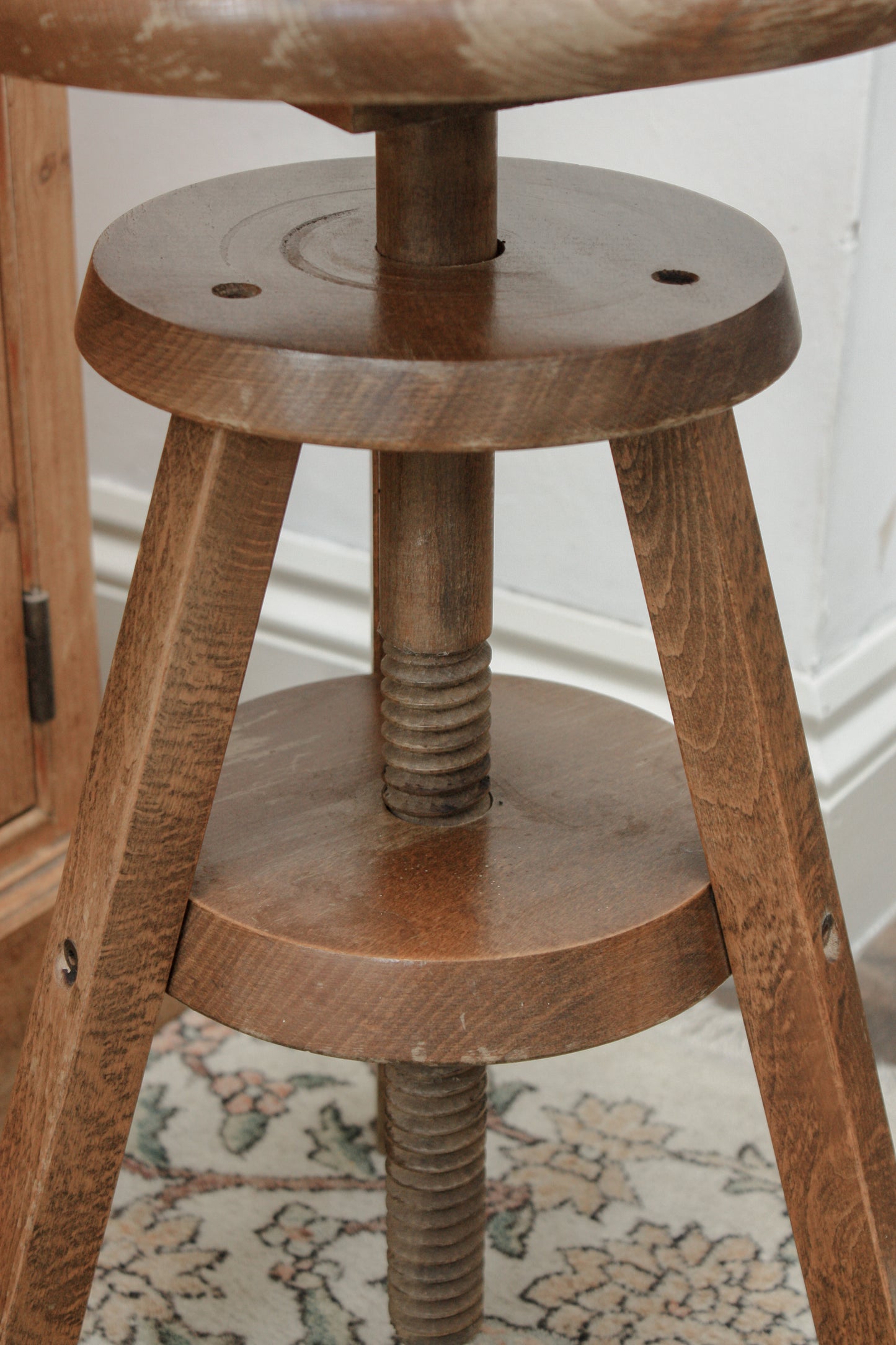 Vintage wooden stool with adjustable seat