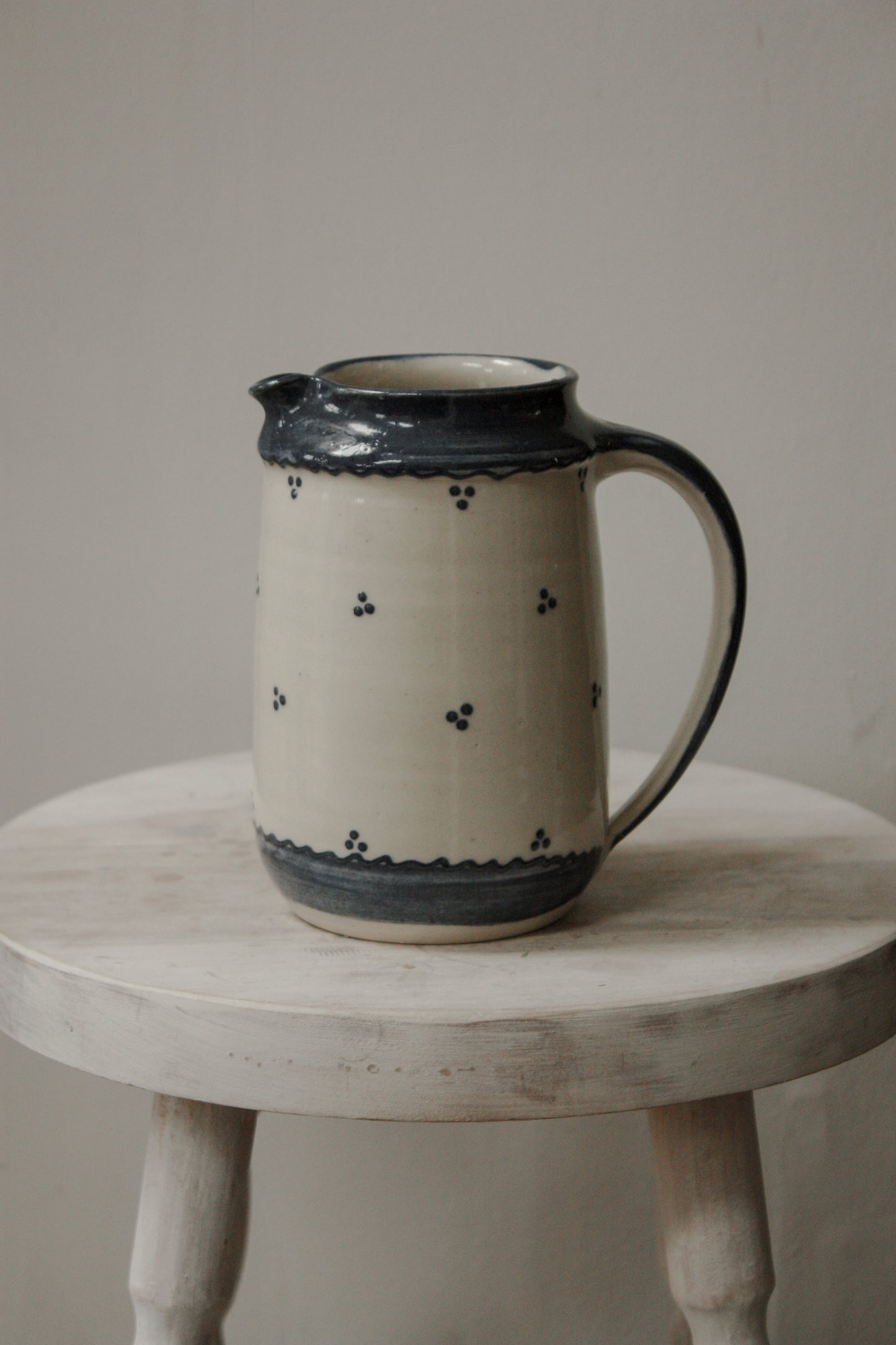 Vintage studio pottery blue and white jug