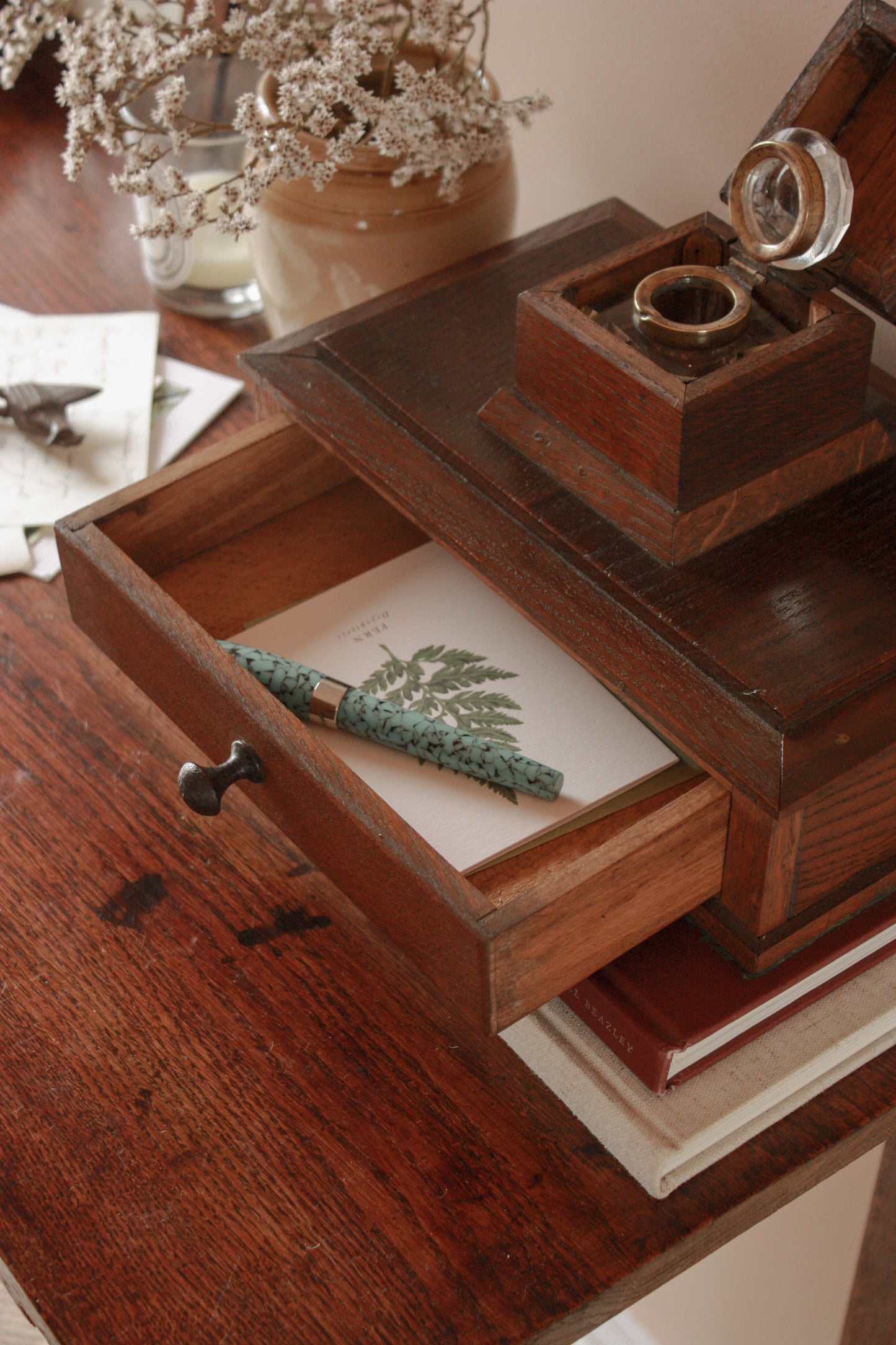 Vintage wooden desktop drawer with ink well