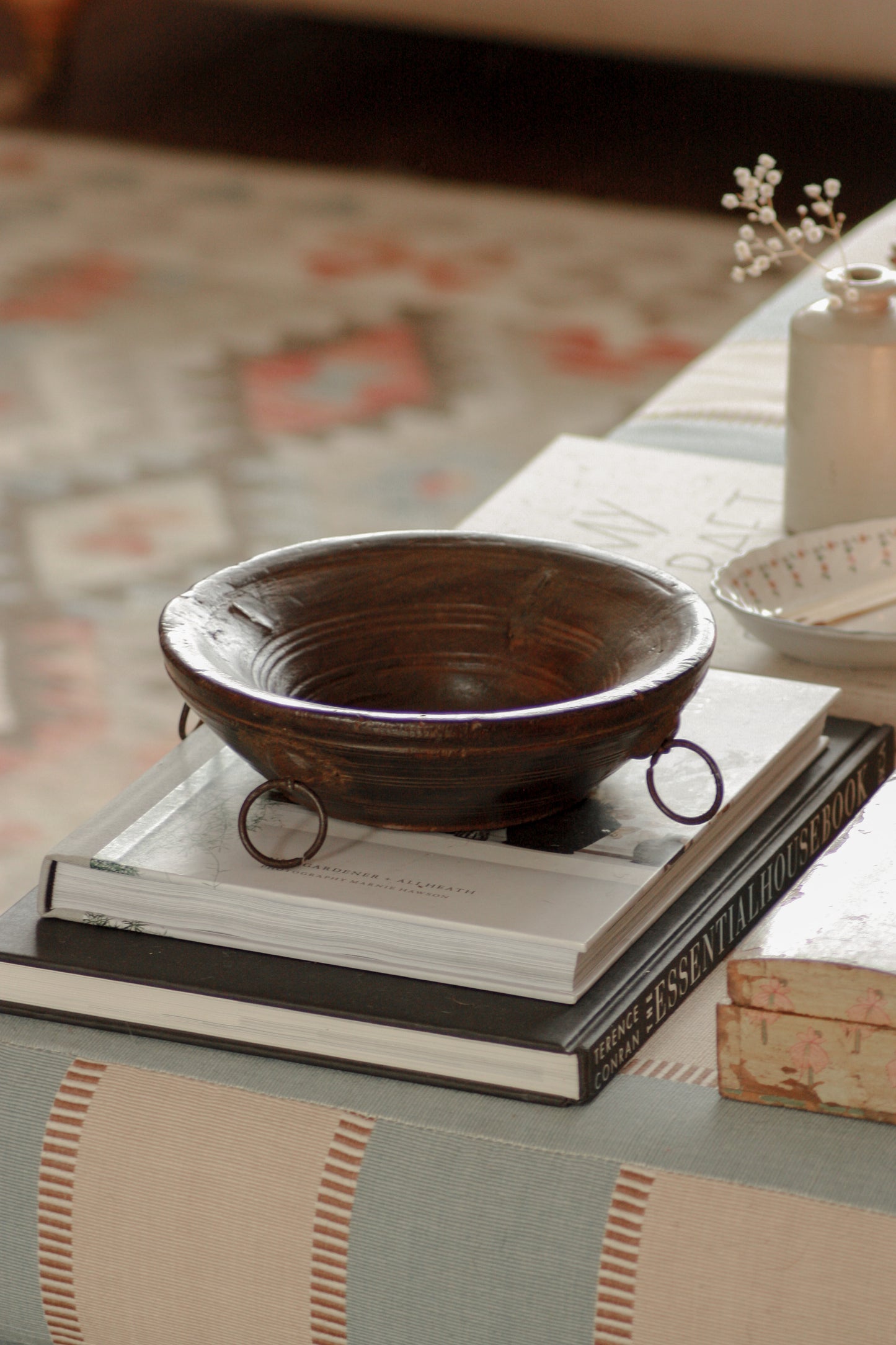 Vintage wooden bowl with metal rings