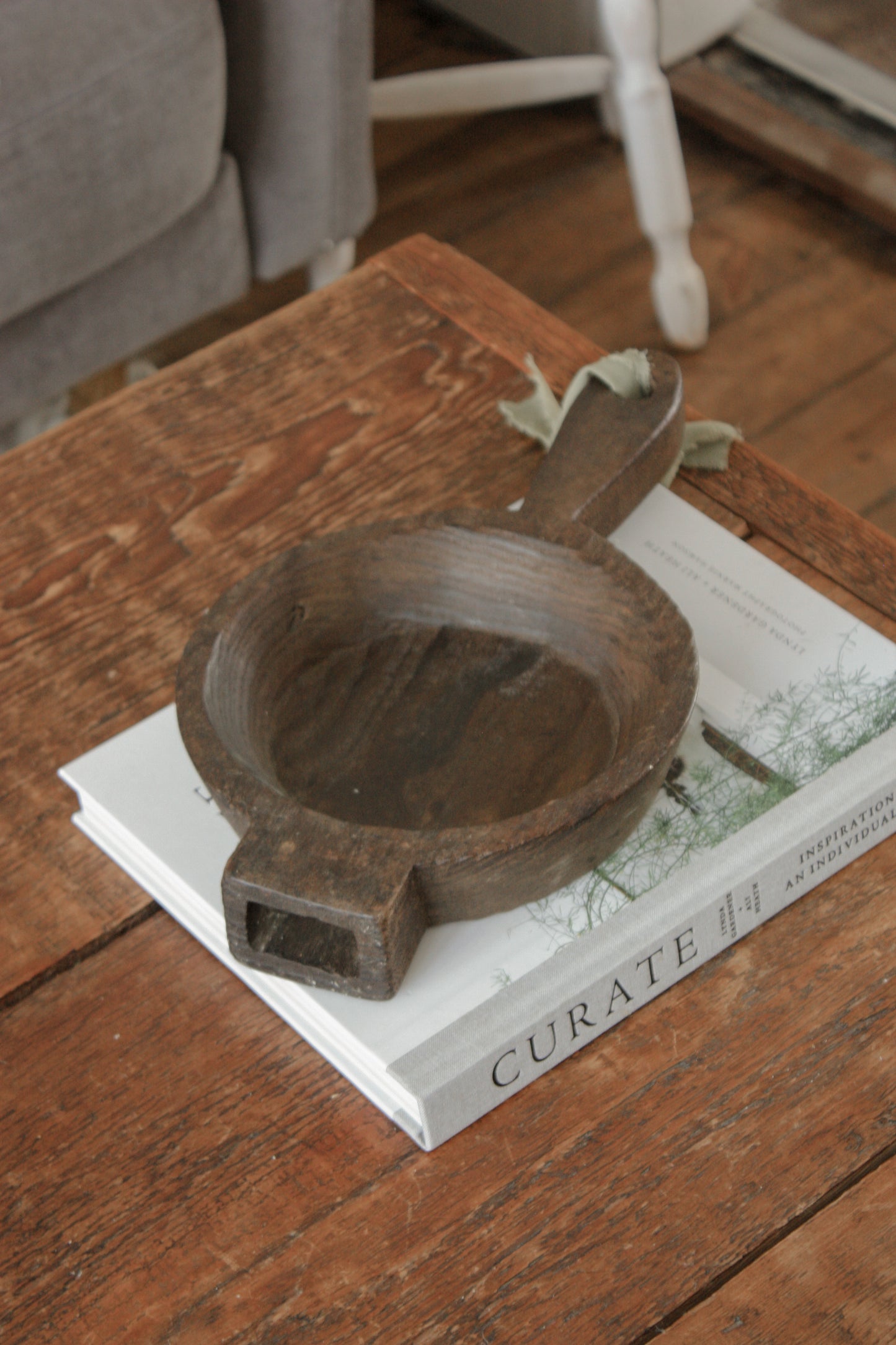 Vintage wooden bowl with handle