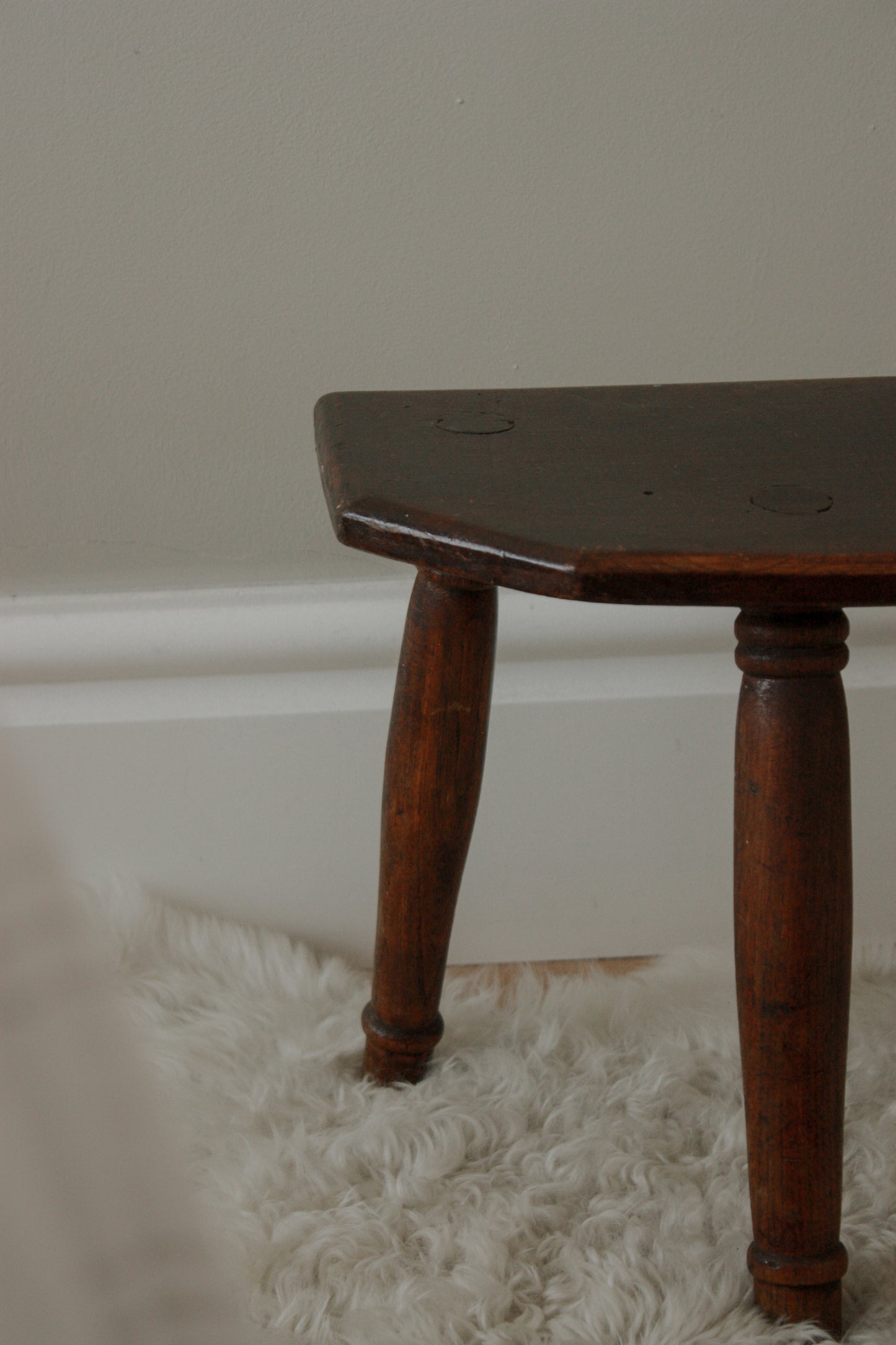 Vintage wooden stool with half hexagon seat