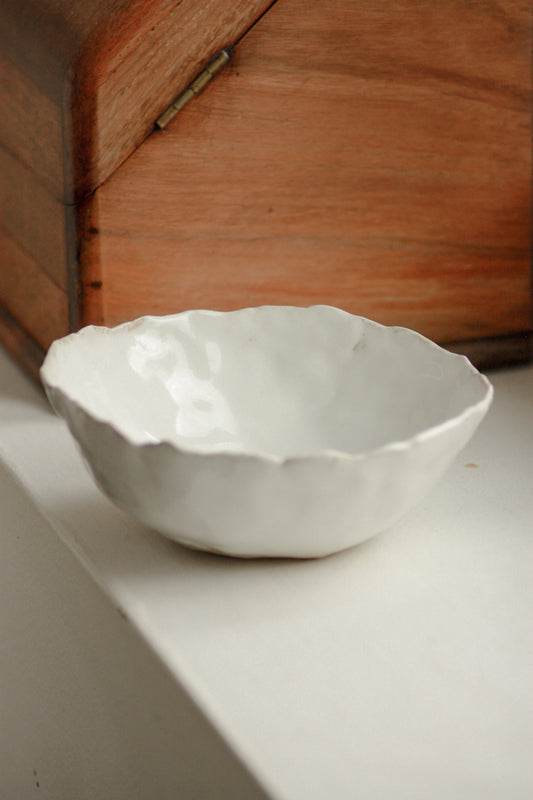 Studio art pottery bowl with rustic white glaze