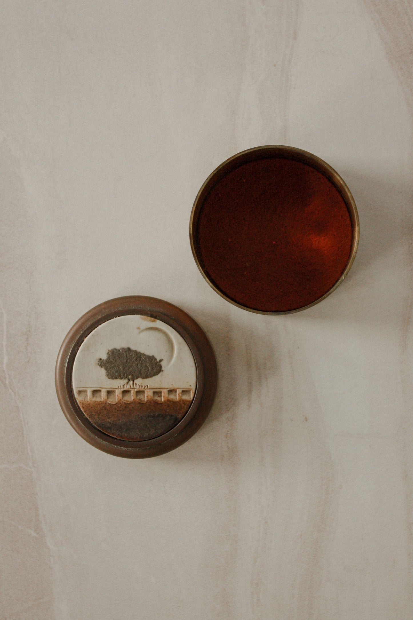 Vintage brass pot with pottery inlay