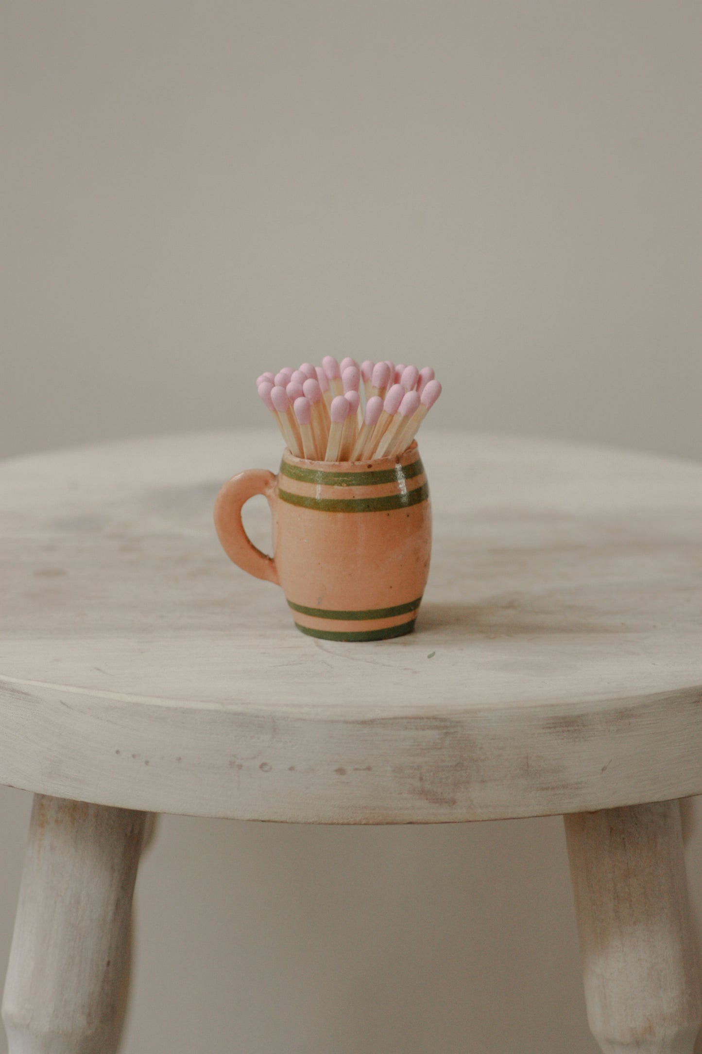 Vintage hand-painted green and peach pink match pot