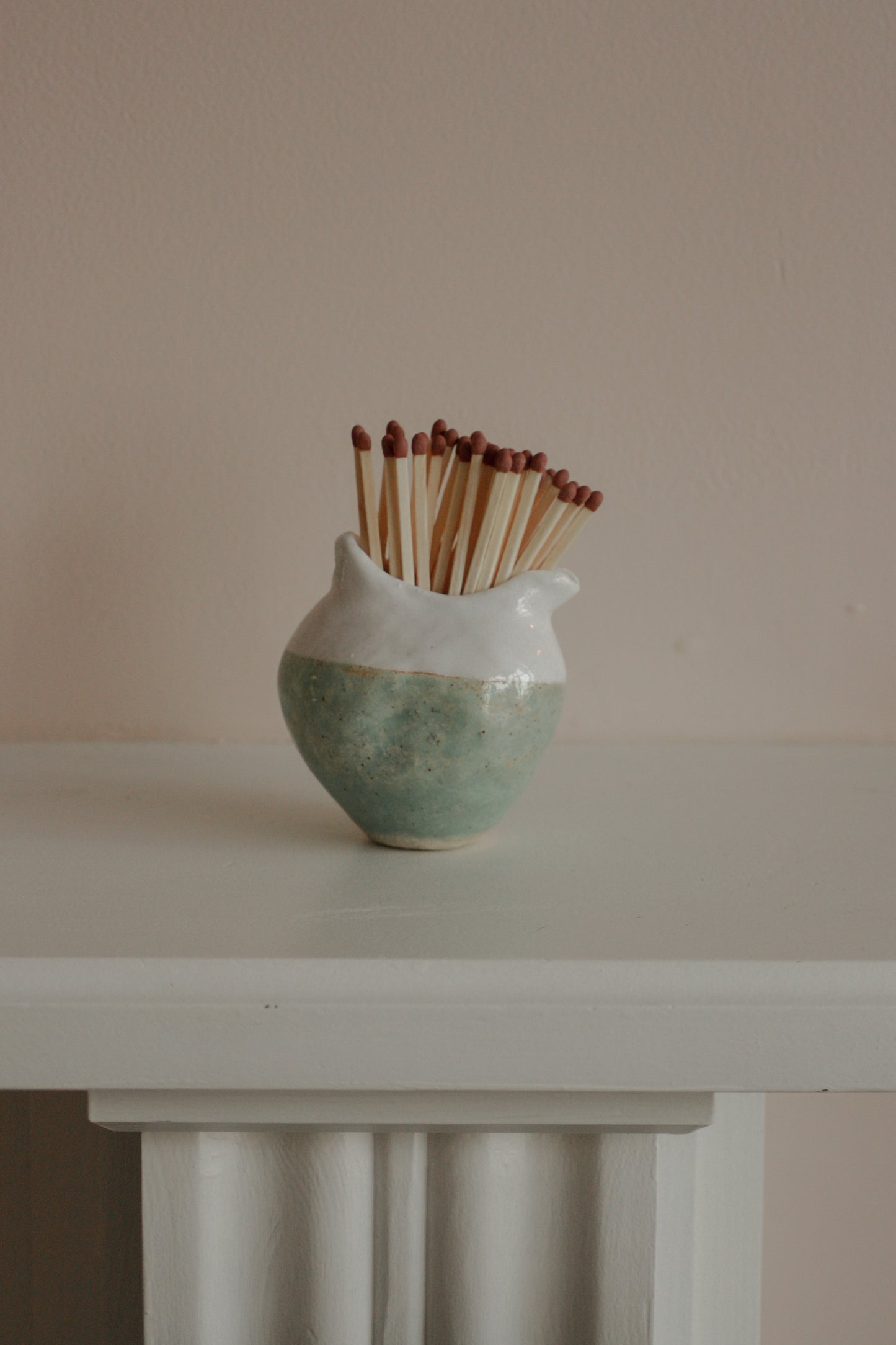 Studio pottery two-tone match pot