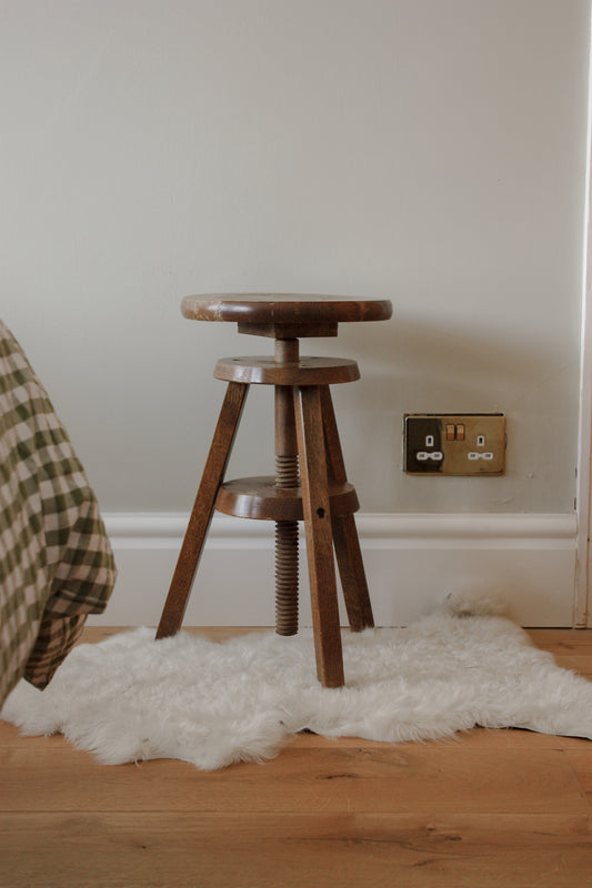 Vintage wooden stool with adjustable seat