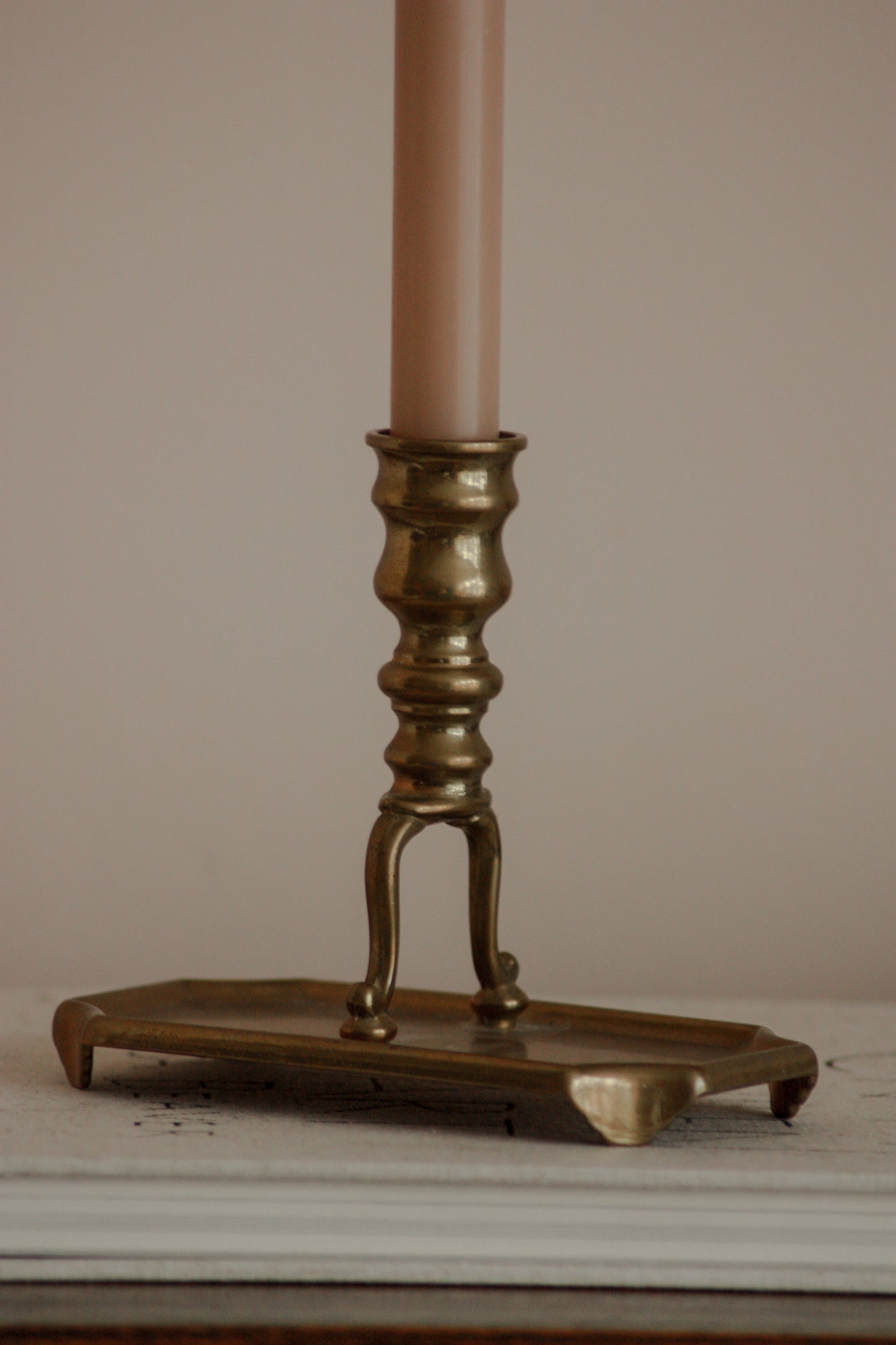 Vintage 1920s brass candleholder with drip tray base