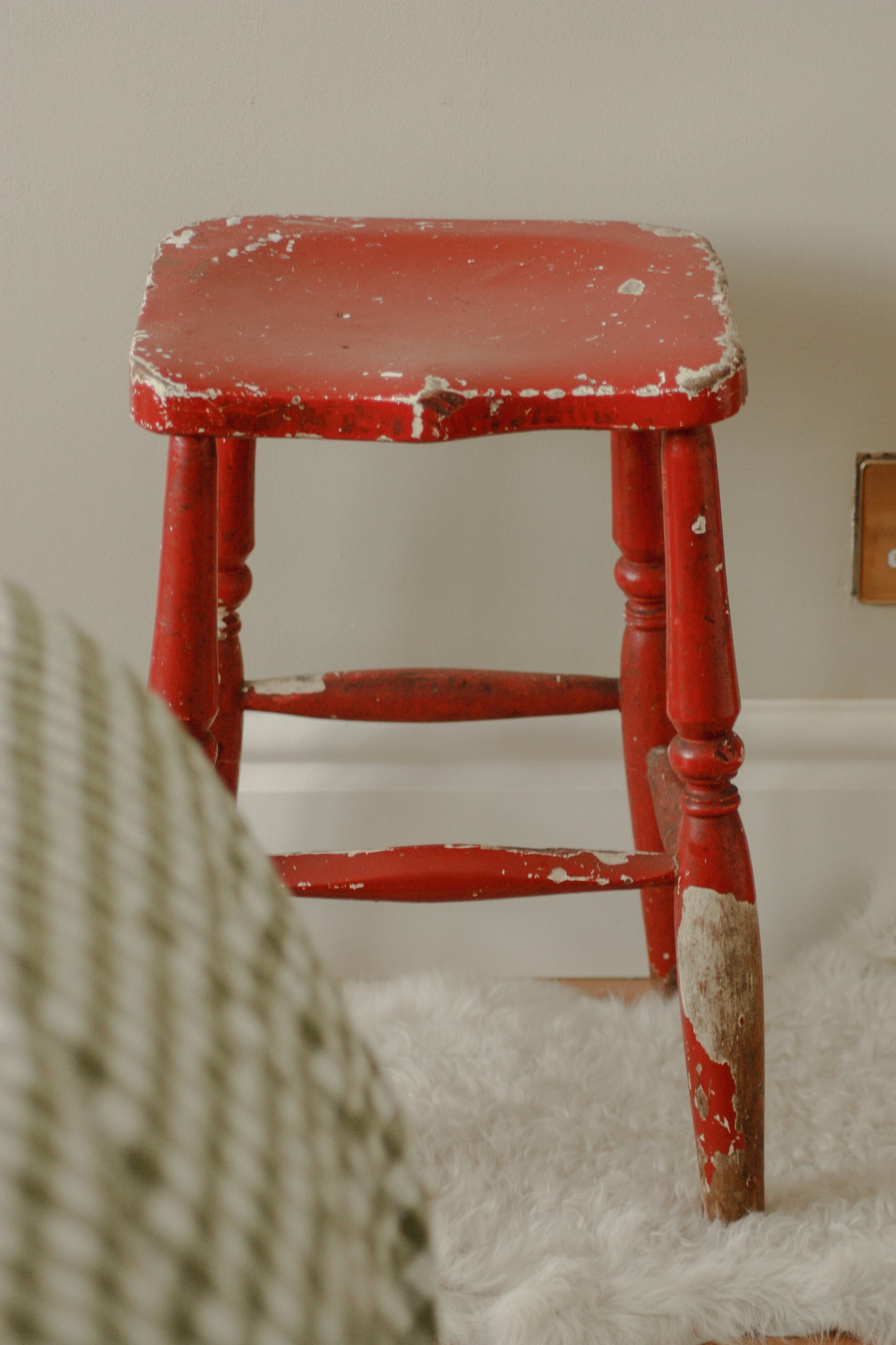 Vintage chippy red stool