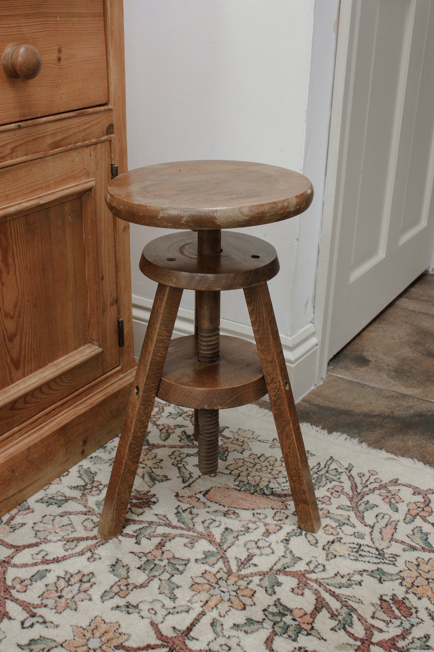 Vintage wooden stool with adjustable seat