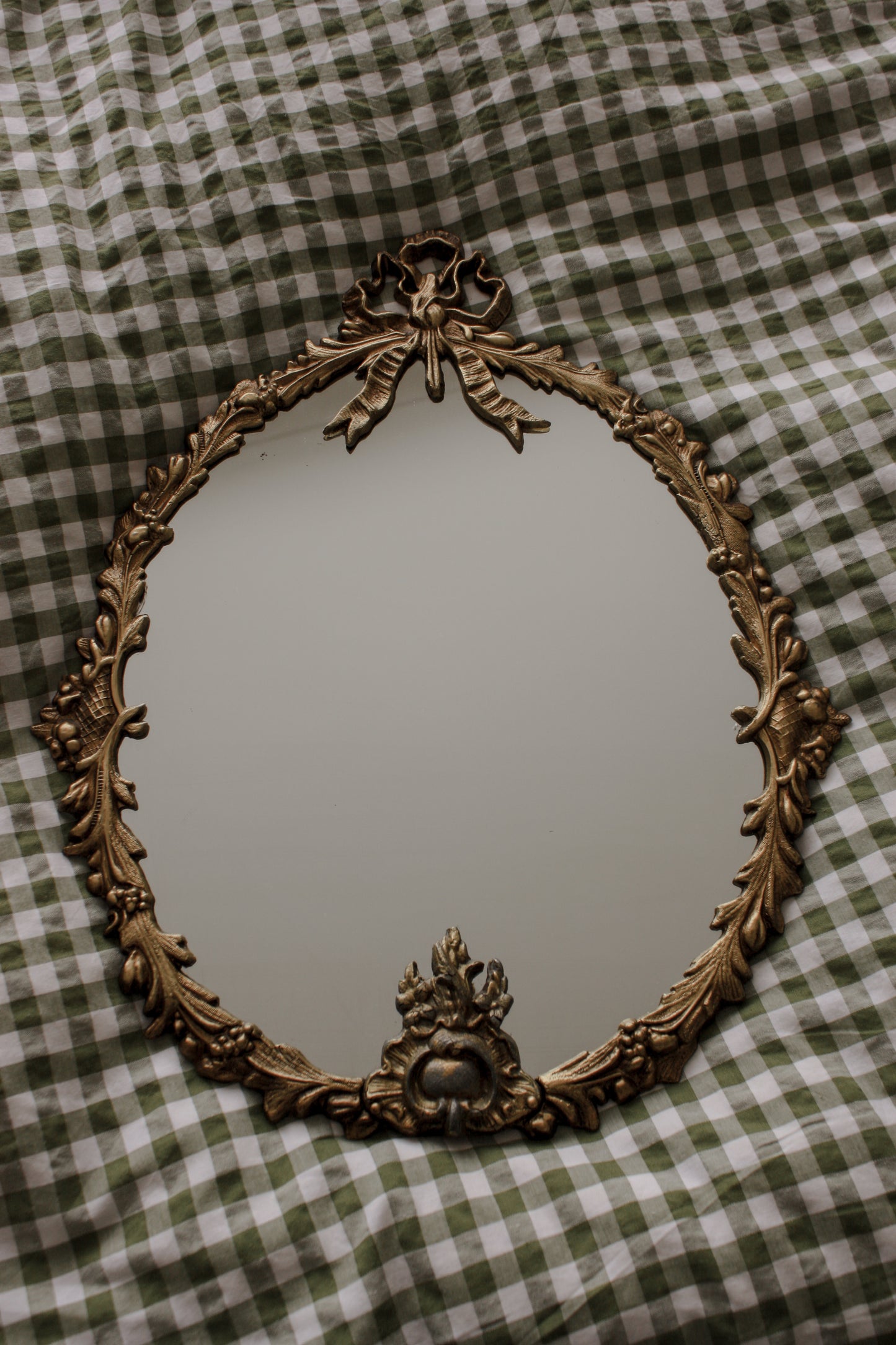 Vintage metal bow mirror