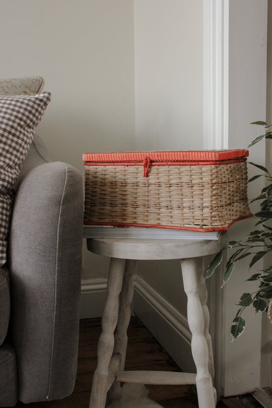 Vintage sewing box with red lining and trim