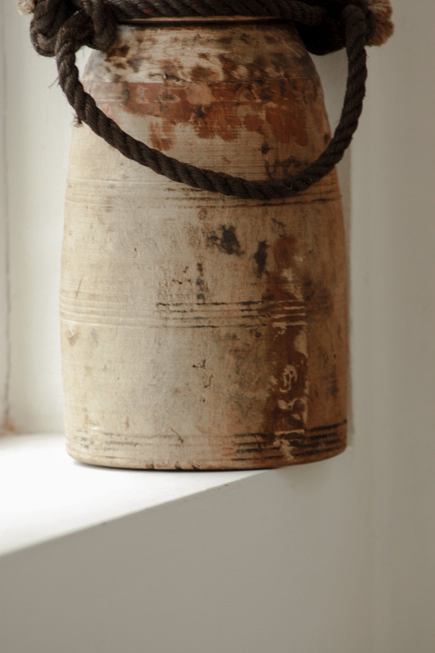 Vintage tall wooden pot with rope handle