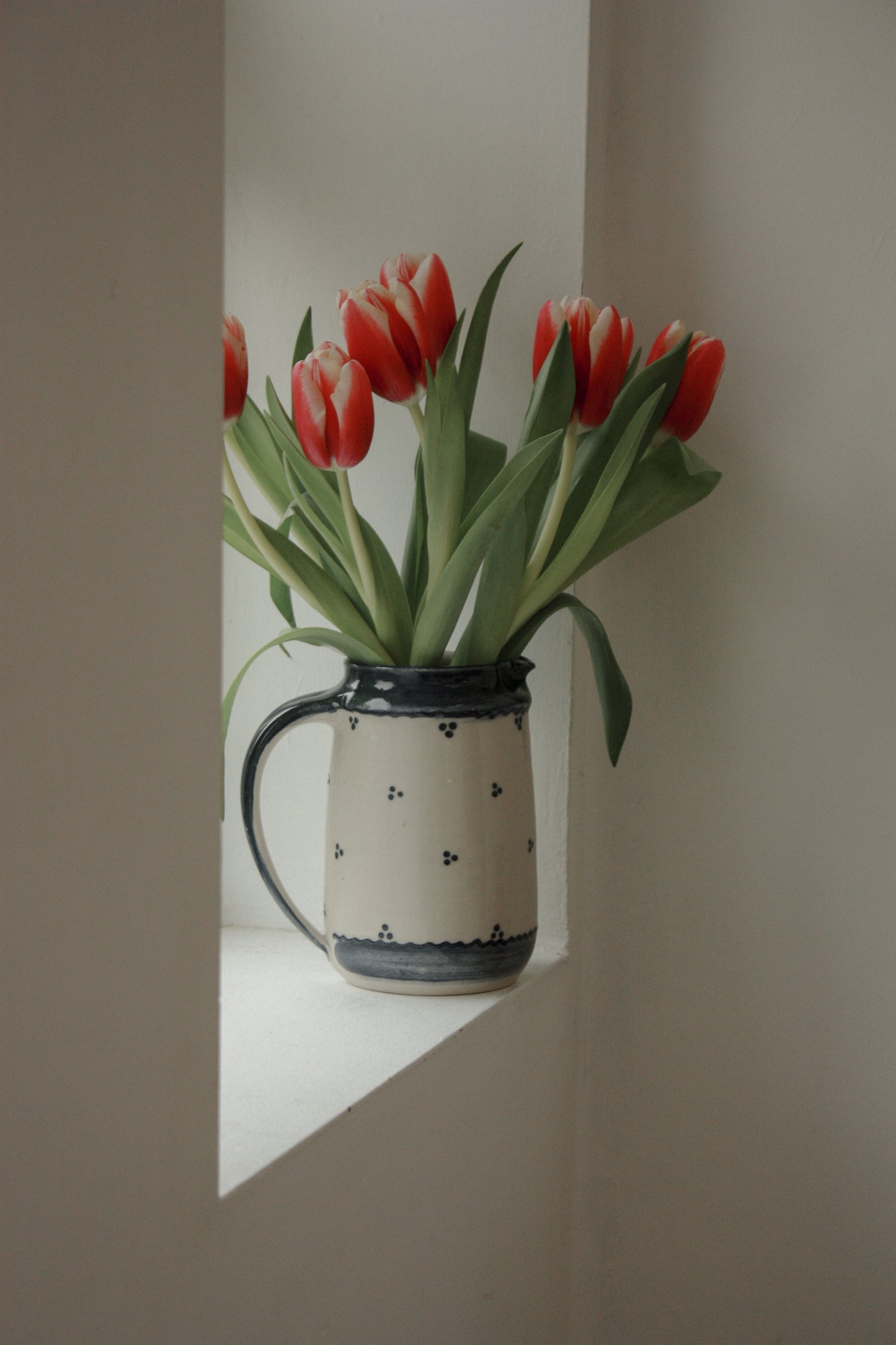 Vintage studio pottery blue and white jug