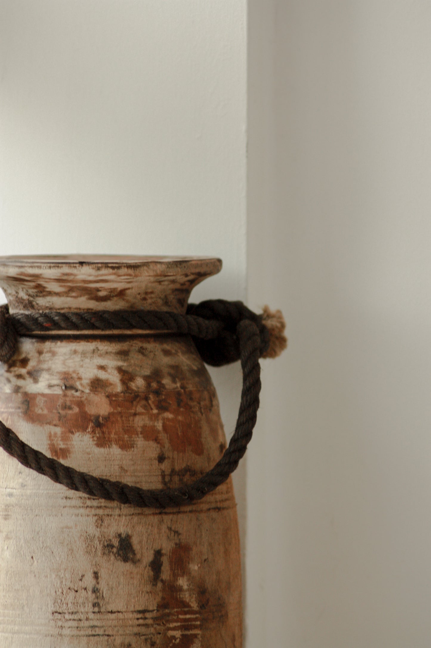 Vintage tall wooden pot with rope handle