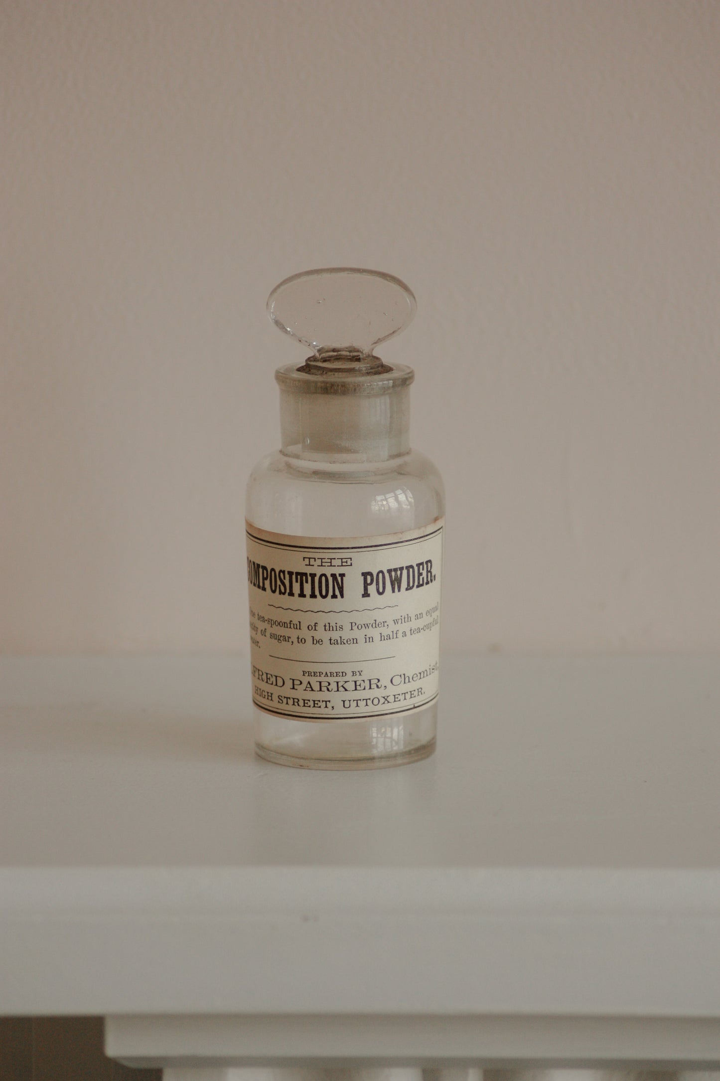 Vintage glass apothecary bottle