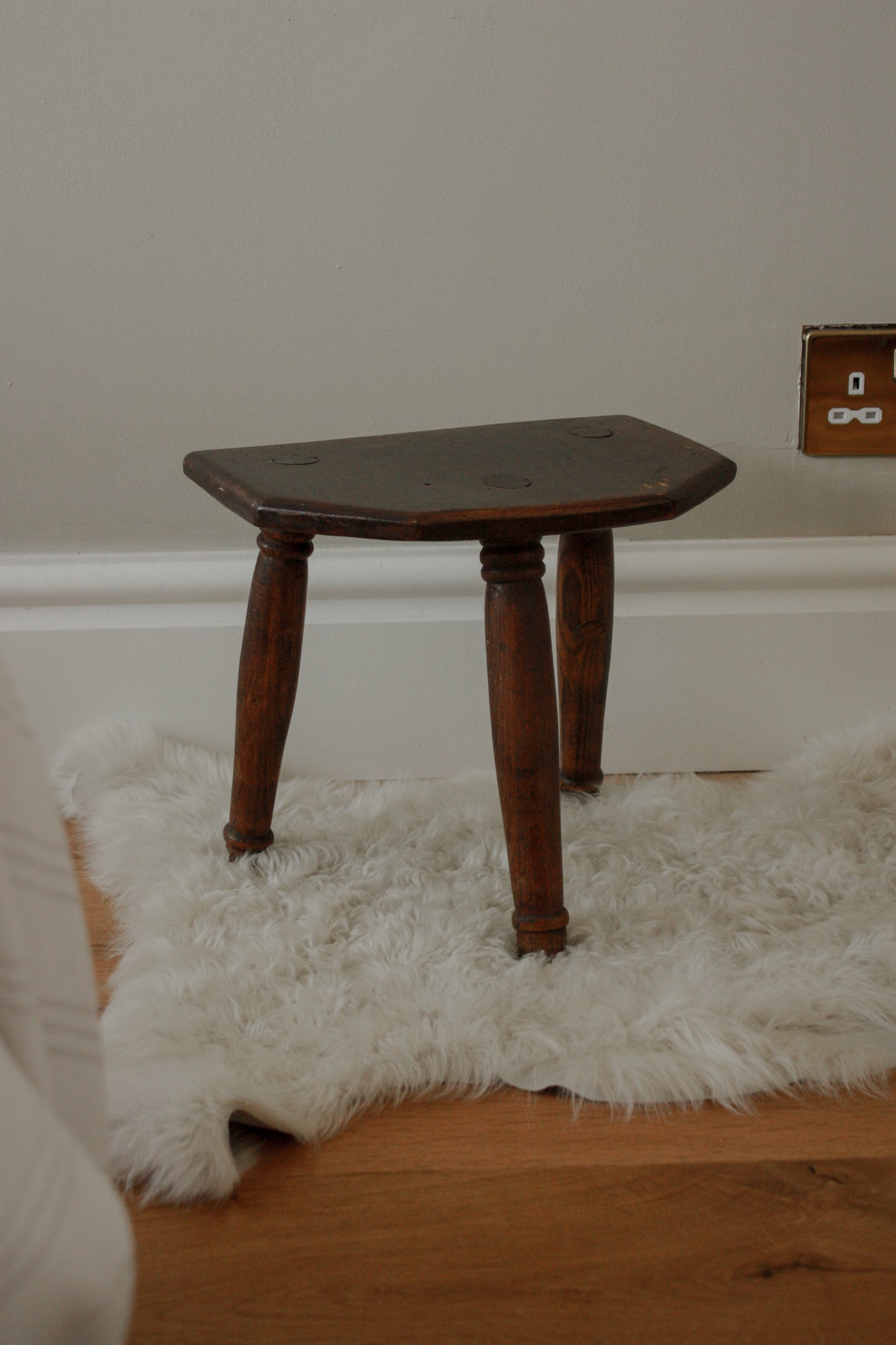 Vintage wooden stool with half hexagon seat