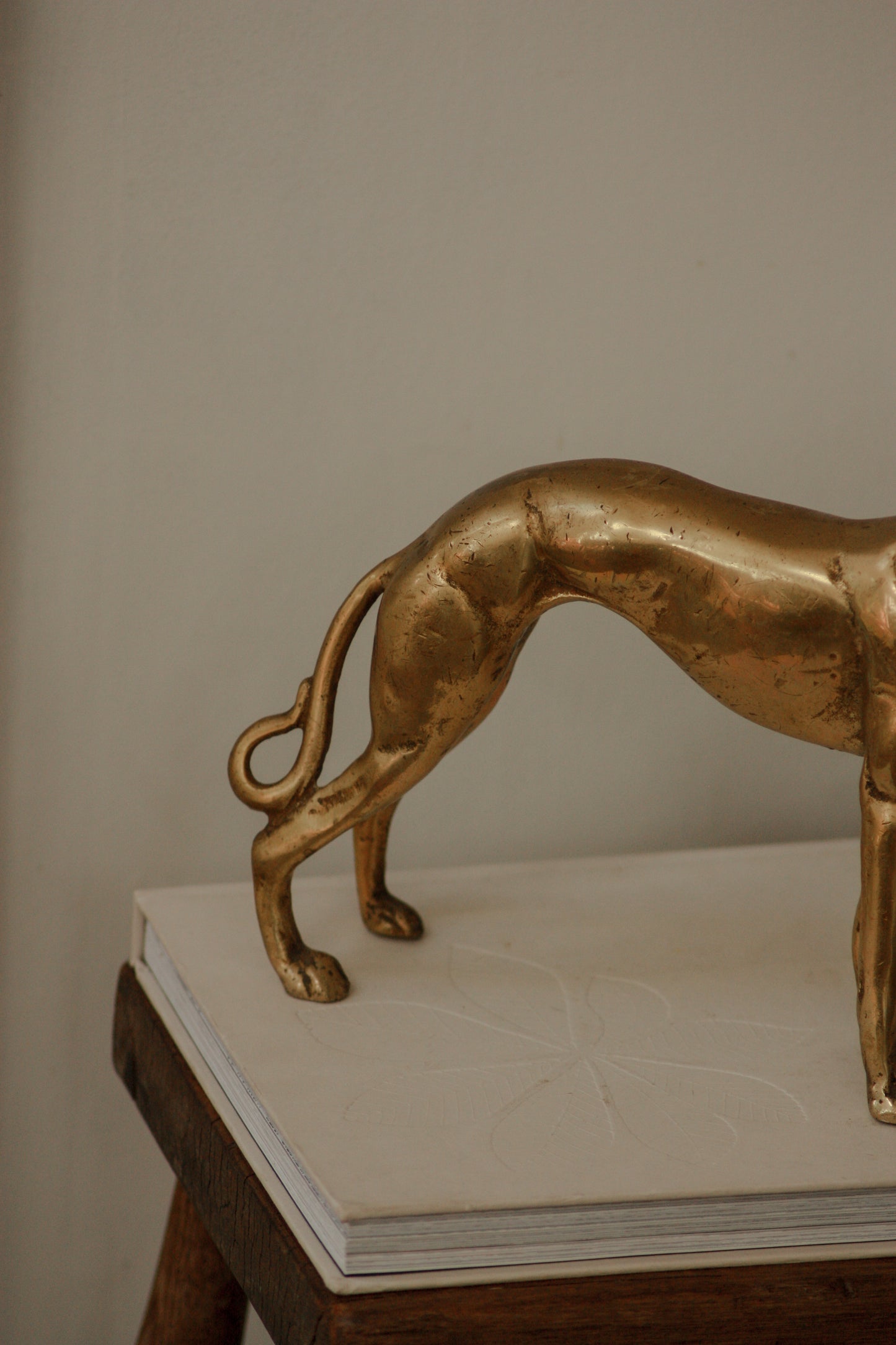 Vintage mid century solid brass lurcher