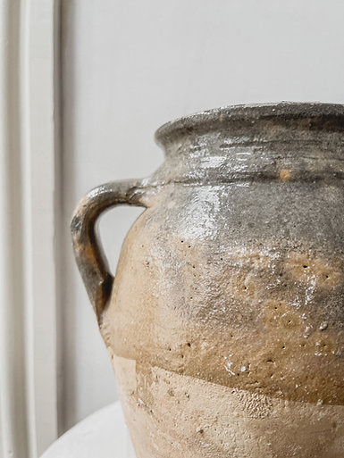 Half glazed antique pot