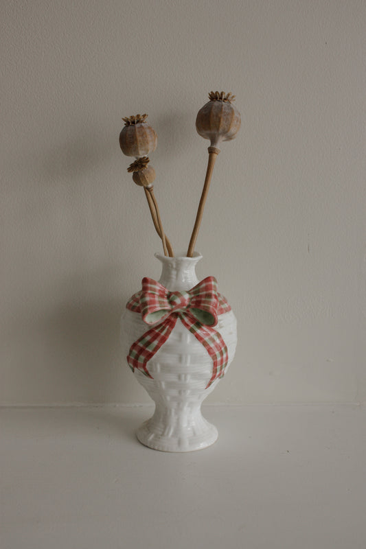 Vintage vessel with ceramic bow