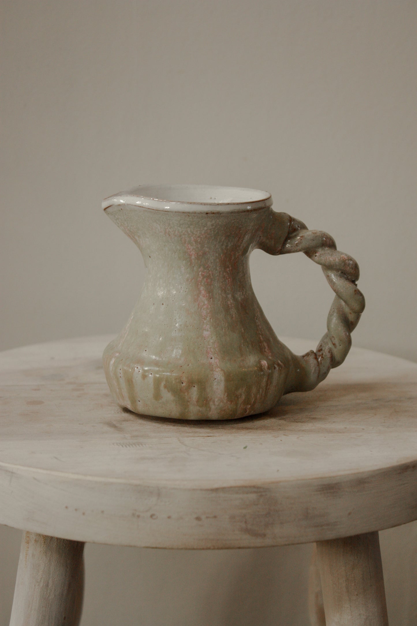 Vintage studio pottery creamer jug with rope handle