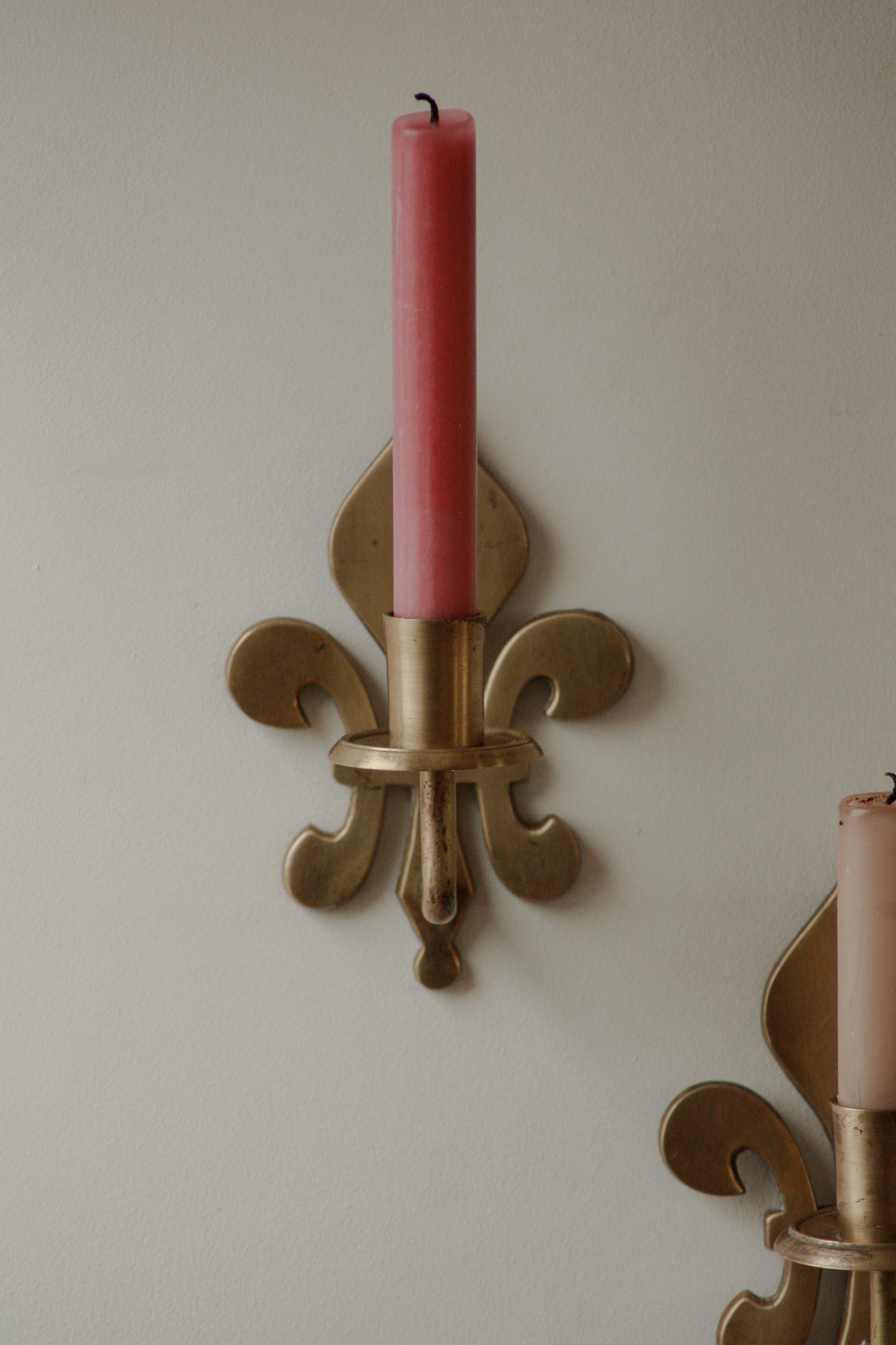 Pair antique brass fleur de lis sconces