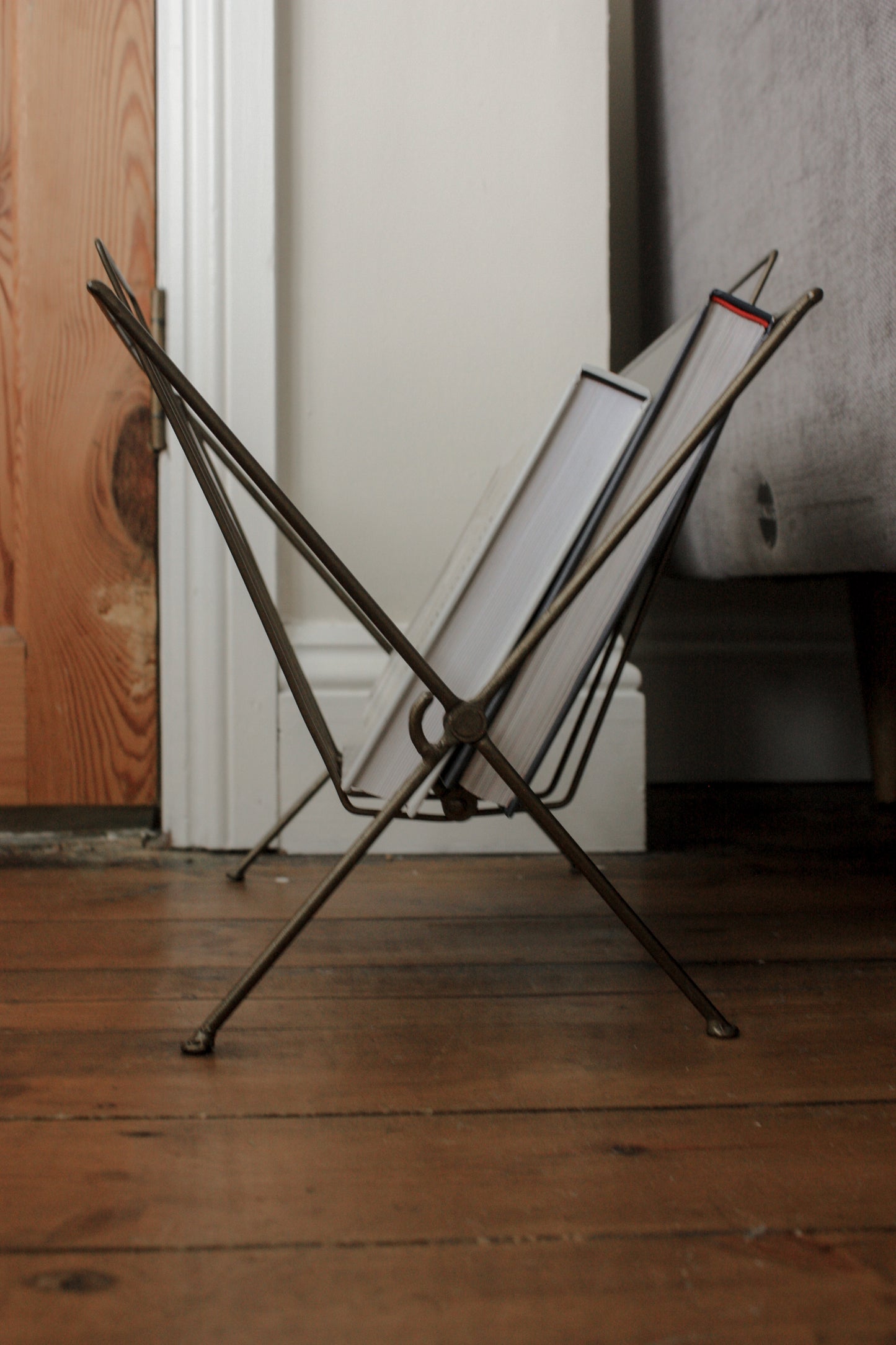 Vintage metal folding magazine rack