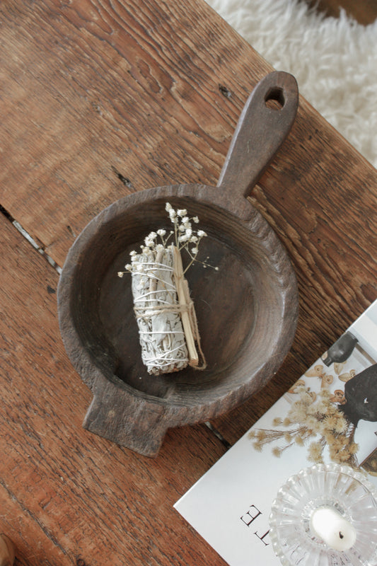 Vintage wooden bowl with handle