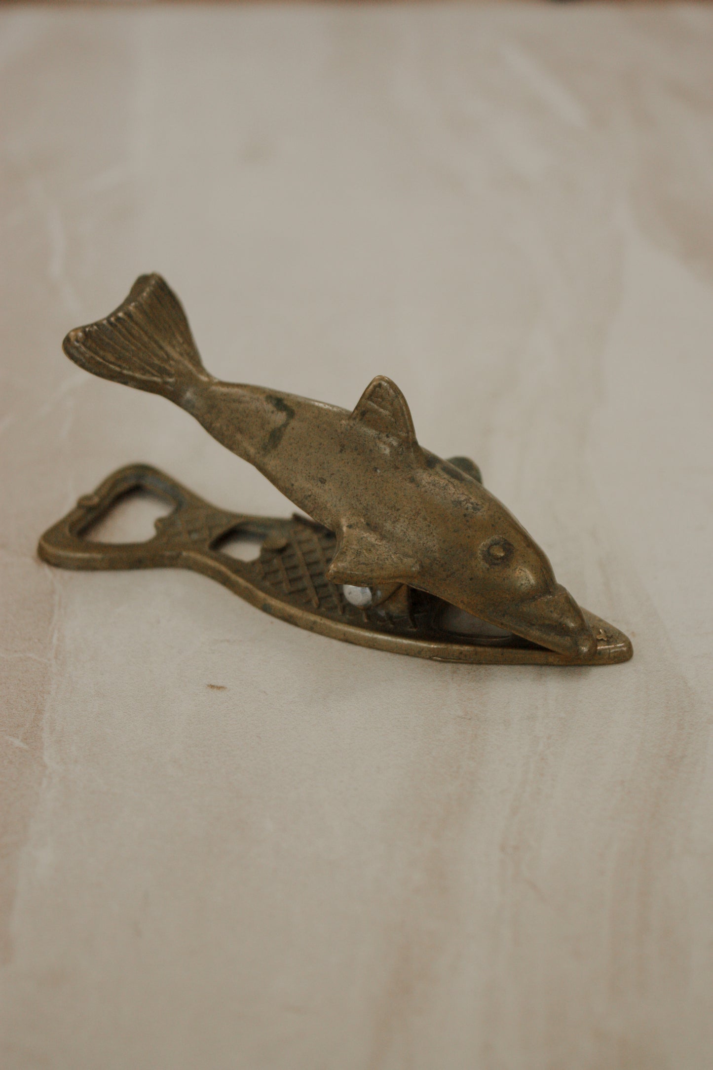 Vintage brass dolphin letter clip / bottle opener