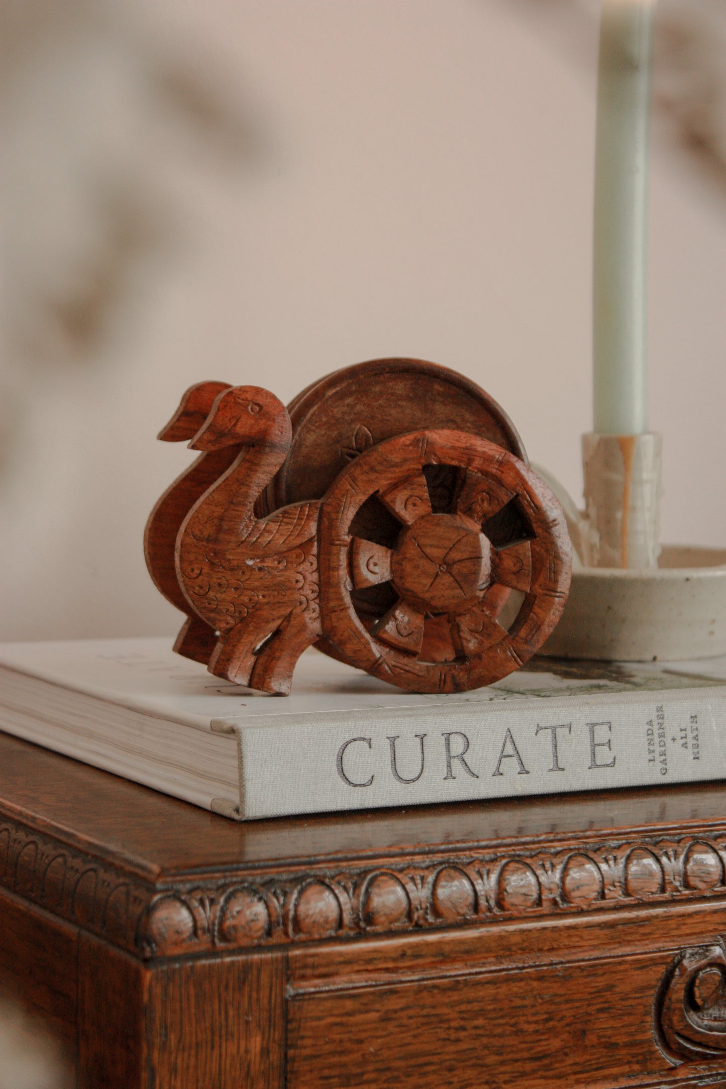 Vintage coaster set with hand carved peacock stand