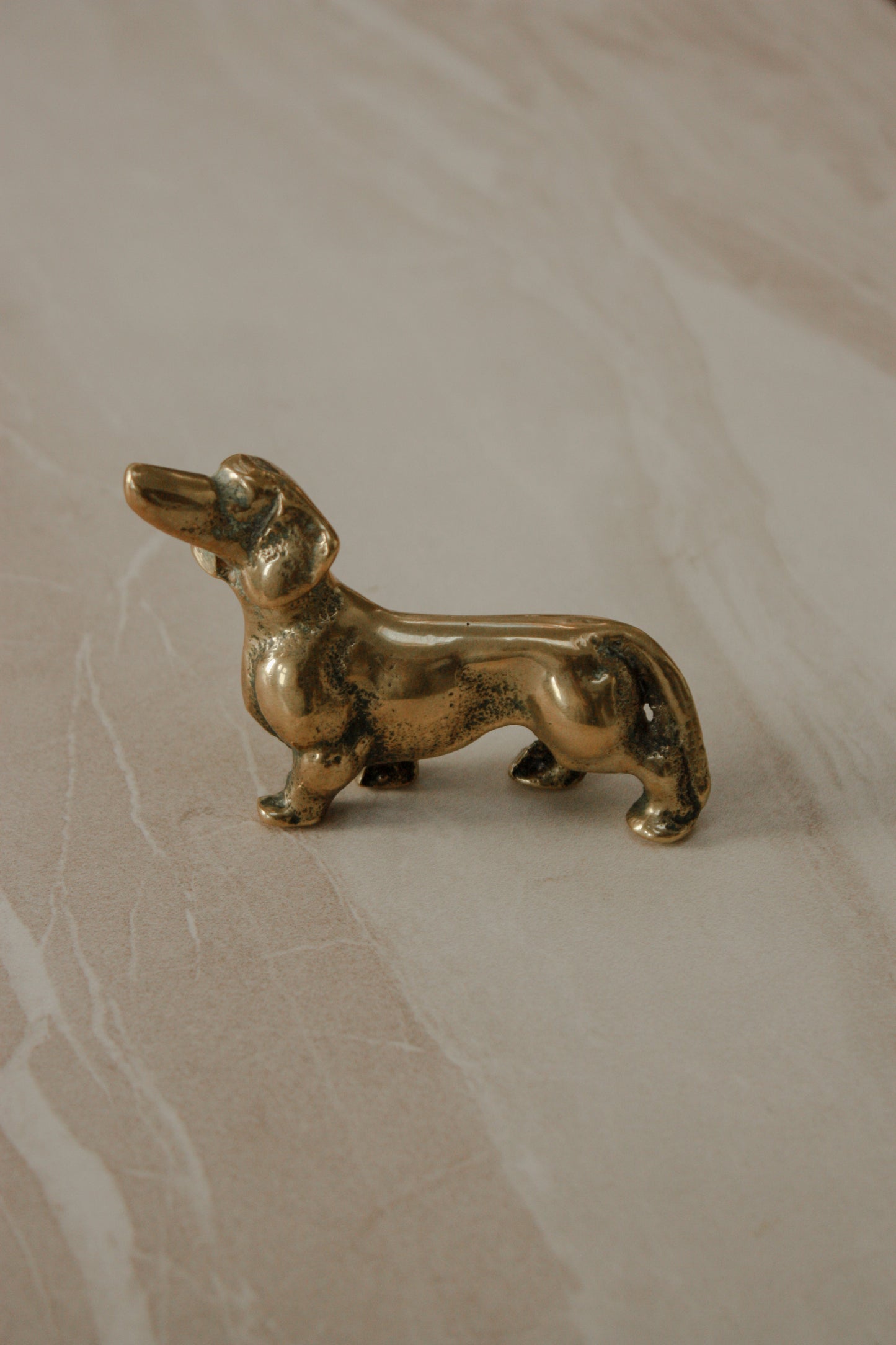 Vintage brass dachshund paperweight