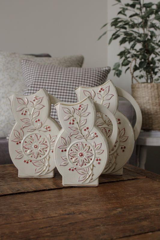 Set of three antique jugs