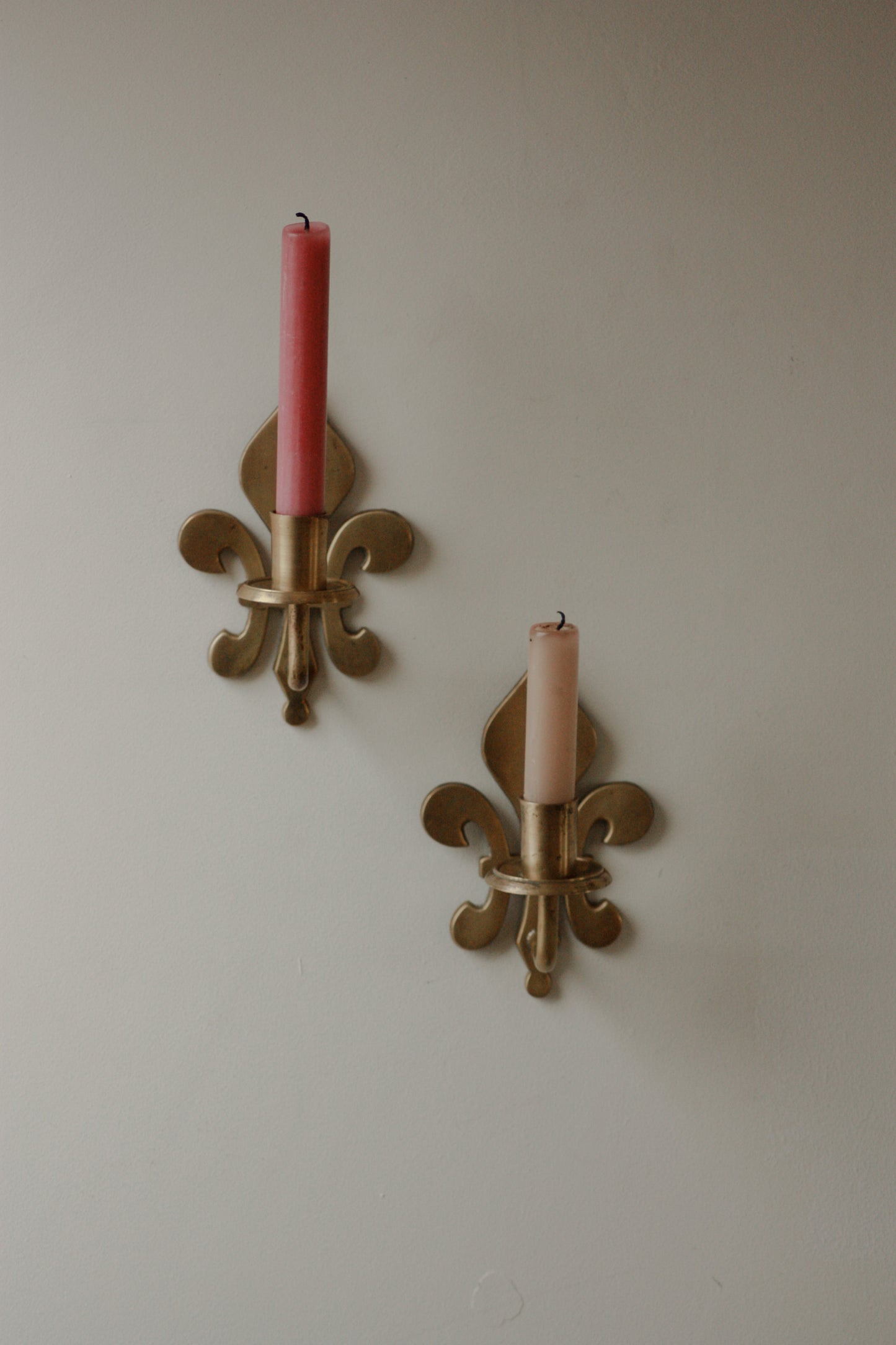 Pair antique brass fleur de lis sconces