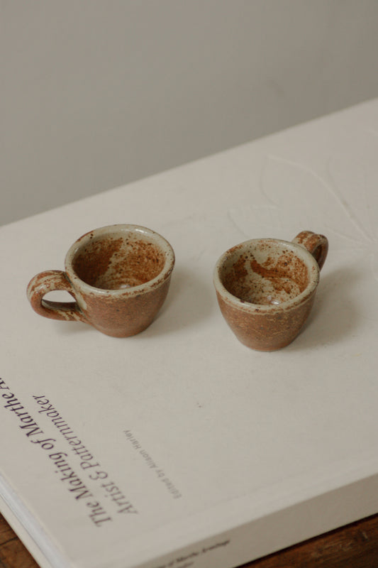 Pair vintage French pinch pot cups