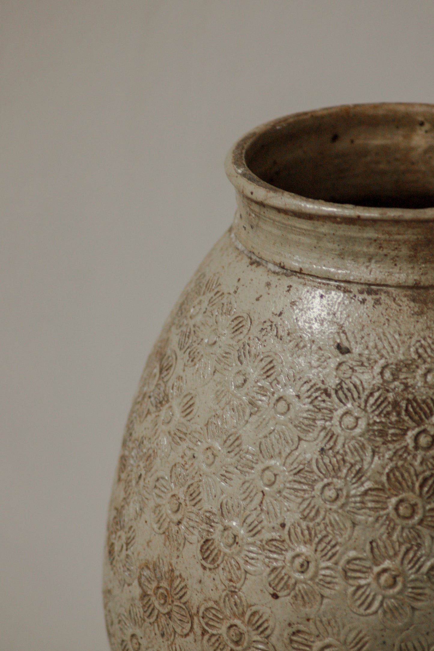 Large antique Asian confit pot with hand stamped floral detail