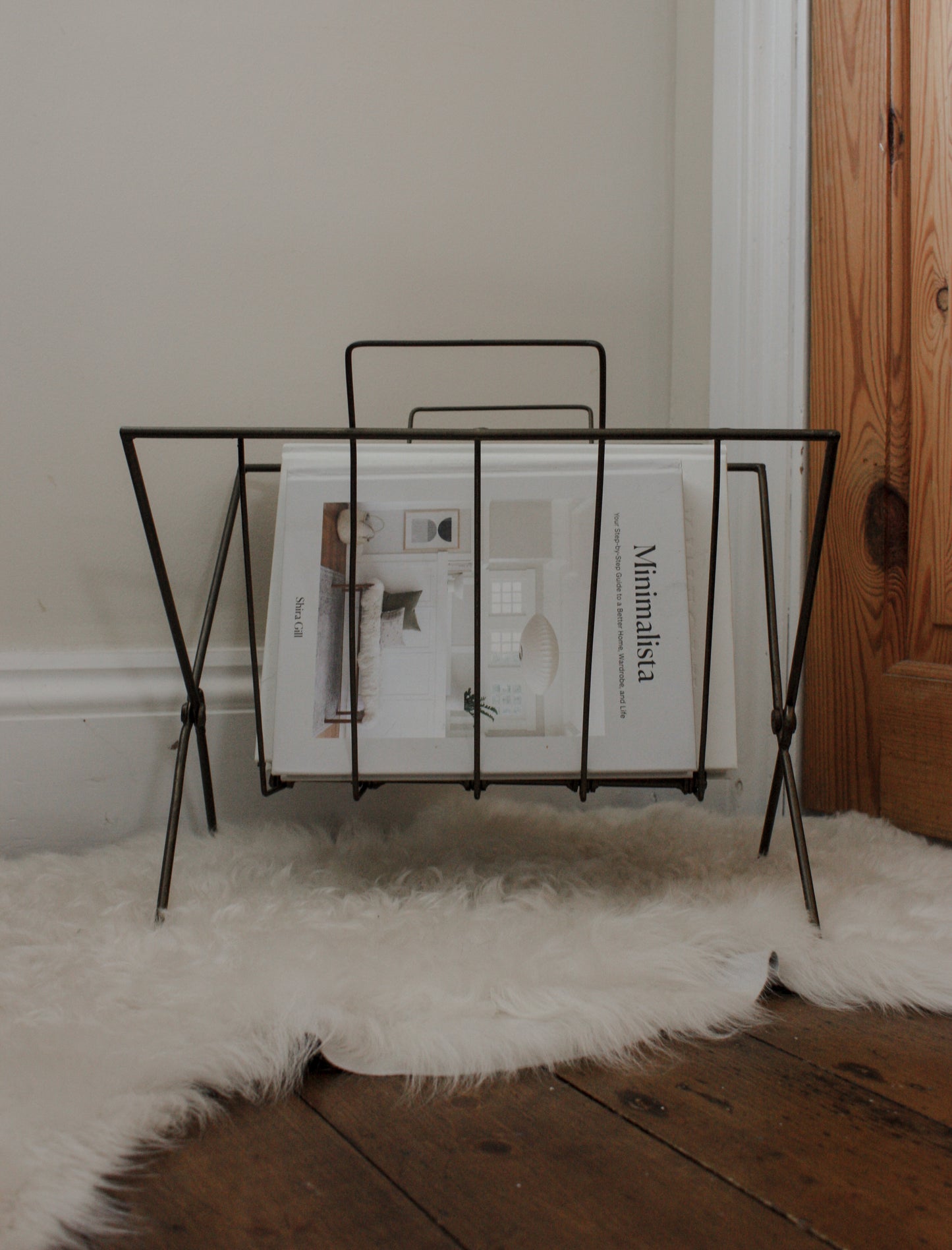 Vintage metal folding magazine rack