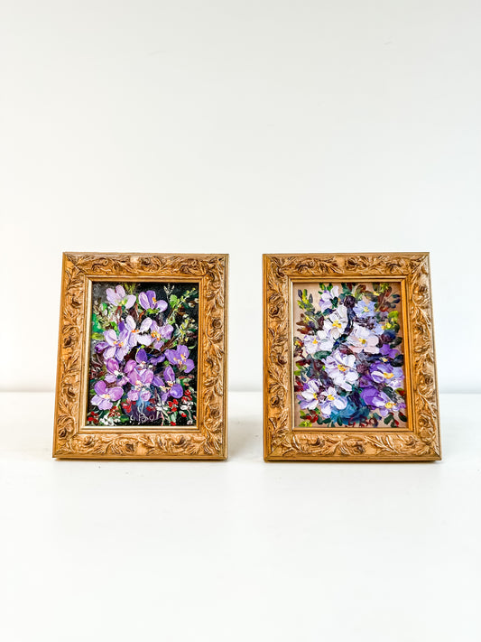 Pair framed vintage floral paintings