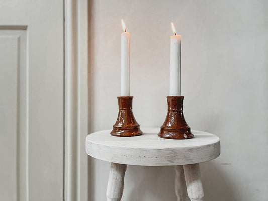 Pair terracotta candleholders