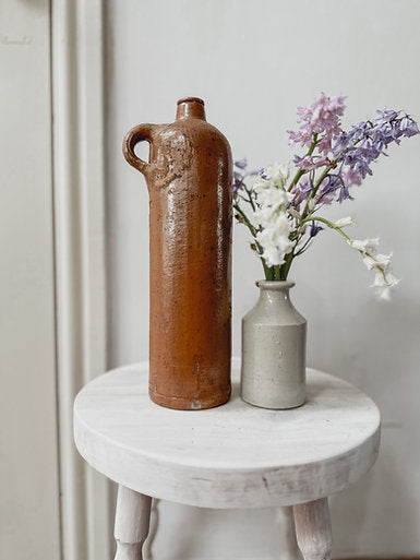 Vintage tall stoneware bottle